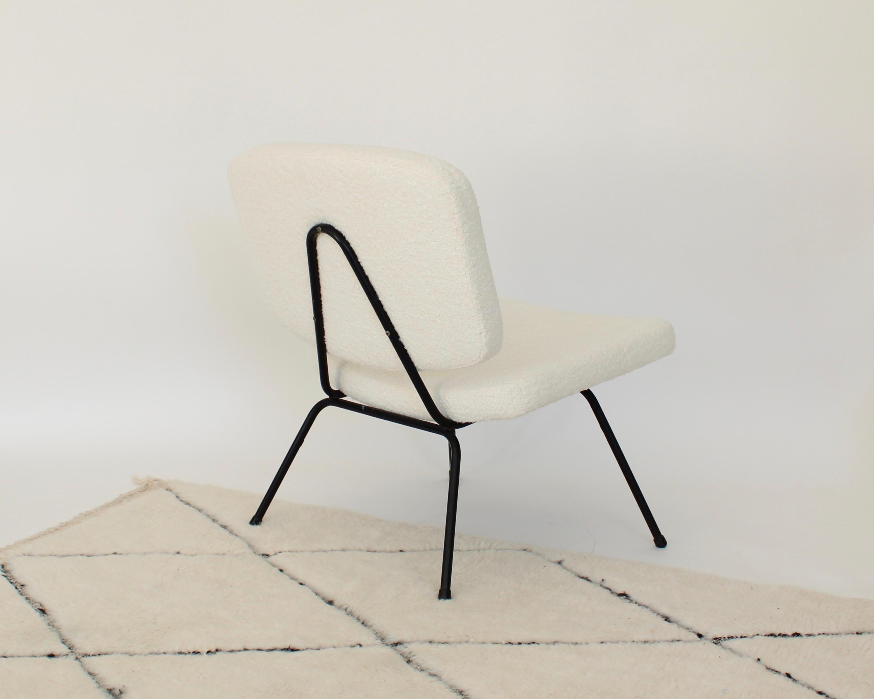 A Pierre Paulin CM190 low lounge or slipper chair designed for Thonet.
Black tubular steel structure with newly reupholstered and new cushions in cream Italian wool blend bouclé
An contemporary luxurious choice of fabric brings this chair to a new