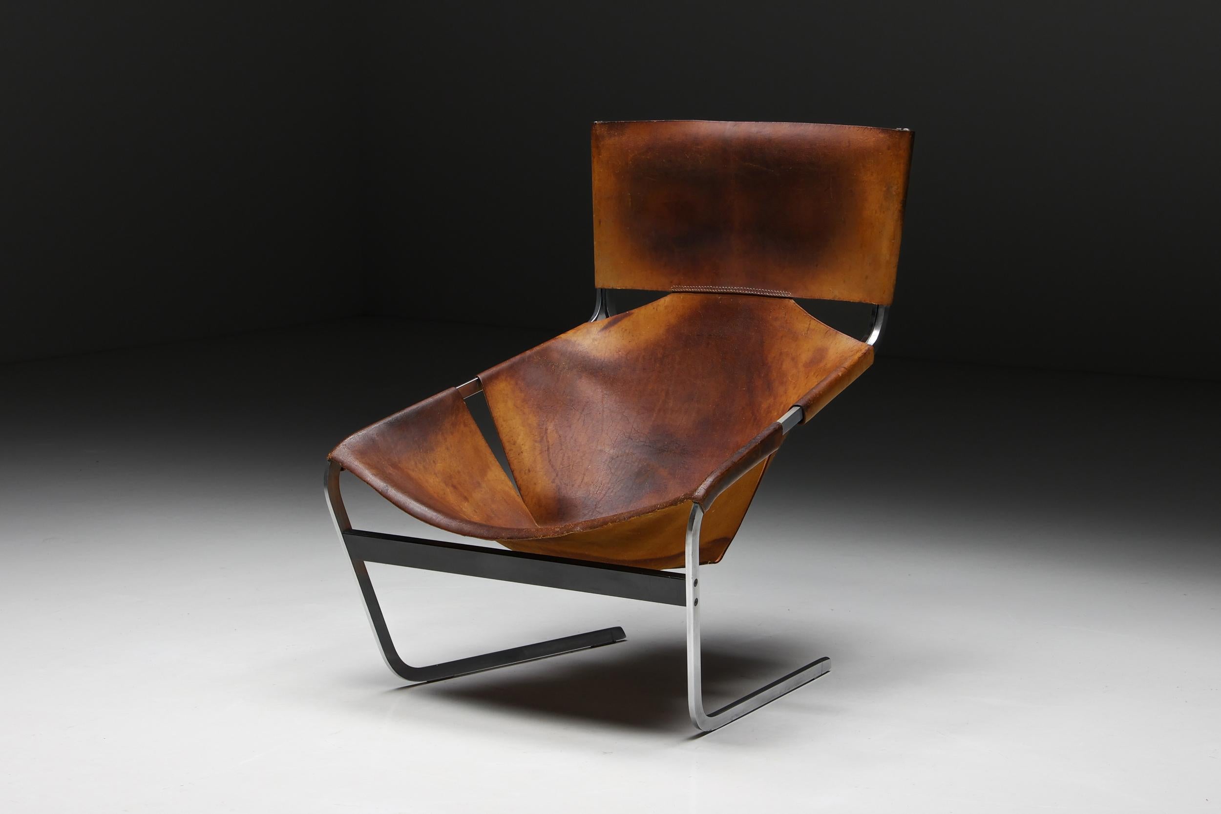 Pierre Paulin; F444; Lounge Chair; Artifort; 1970s; Netherlands; Holland; Cognac; Leather; Metal Frame; Easy Chair; Armchair; 

Lounge chair model F444 in dark cognac leather, designed by Pierre Paulin and manufactured by Artifort in Holland in