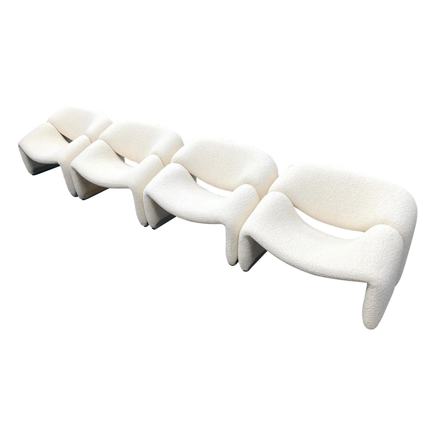 Pair of f598 ‘Groovy’ 'M' lounge chairs by Pierre Paulin for Artifort – Netherlands, 1972.
Price is per chair
The chairs have been new upholstered in a beautiful off-white bouclé wool fabric from Paris. 
Feet colours available in black, white and