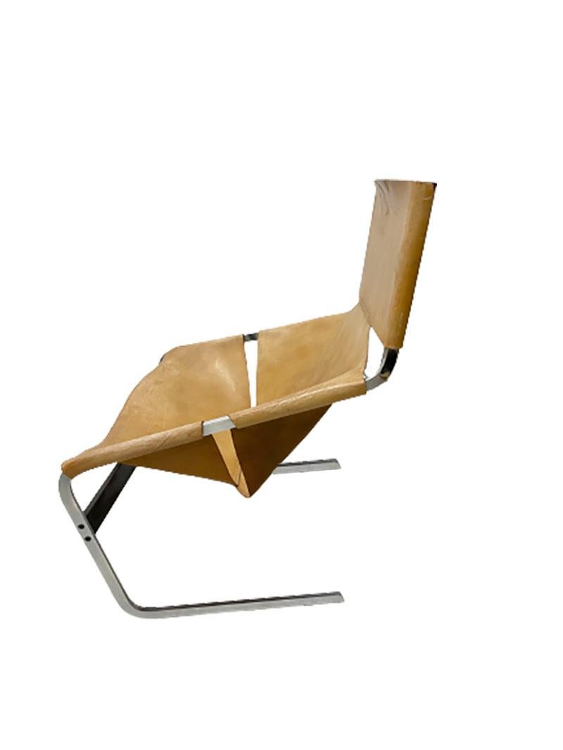 Pierre Paulin for Artifort, model F-444 Lounge Chair. 

This lounge chair is an original Pierre Paulin Model F-444 chair from 1963, but the chair is in used condition. The chair is upholstered in leather (torn left front). 
The chair is marked on