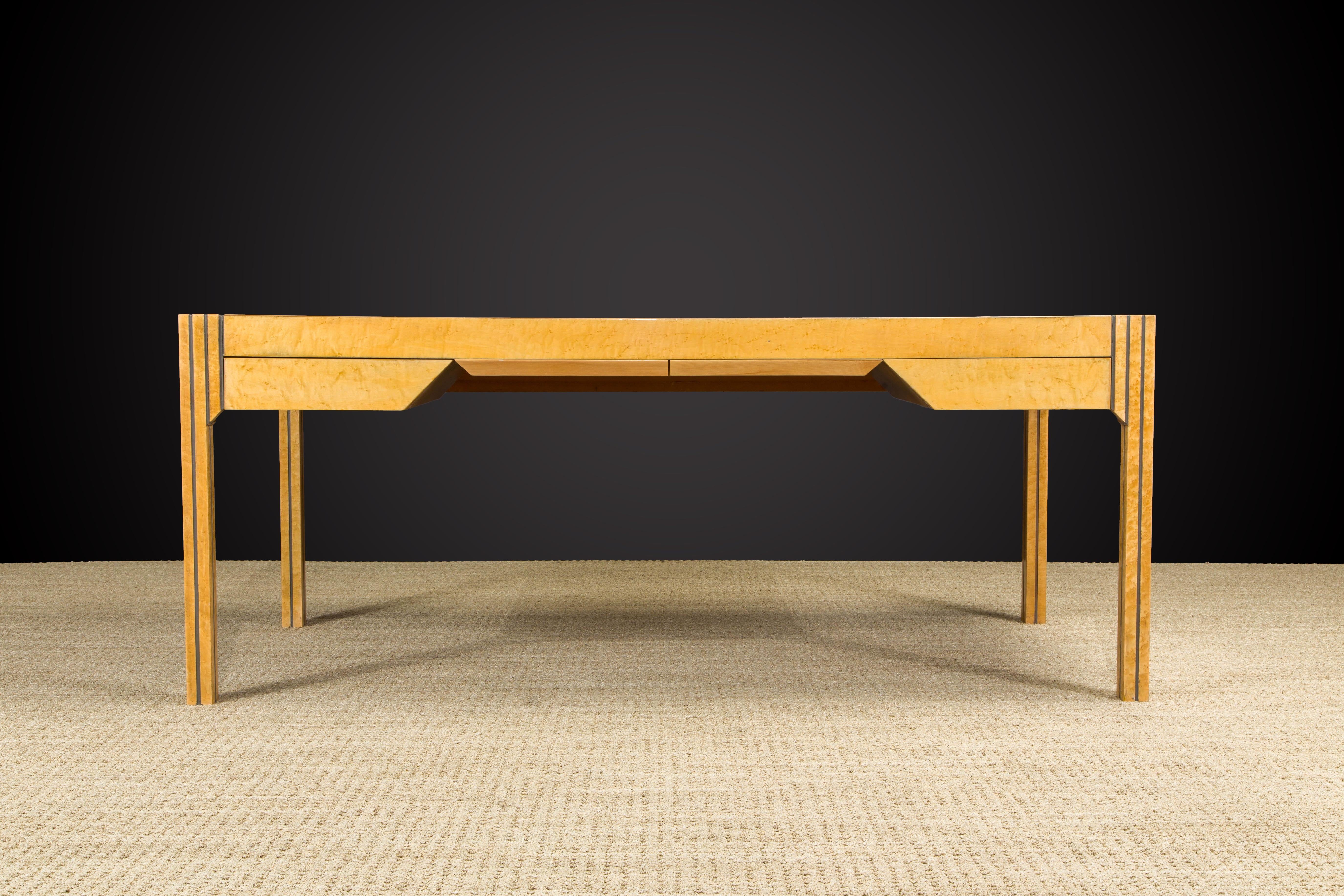 This rare desk by Pierre Paulin for 'The Paulin Collection' by Baker features incredible angular lines of Bird's-Eye Maple and inset leather. With a slightly art deco influence and a whole lot of modernist - this collector's piece is an otherwise