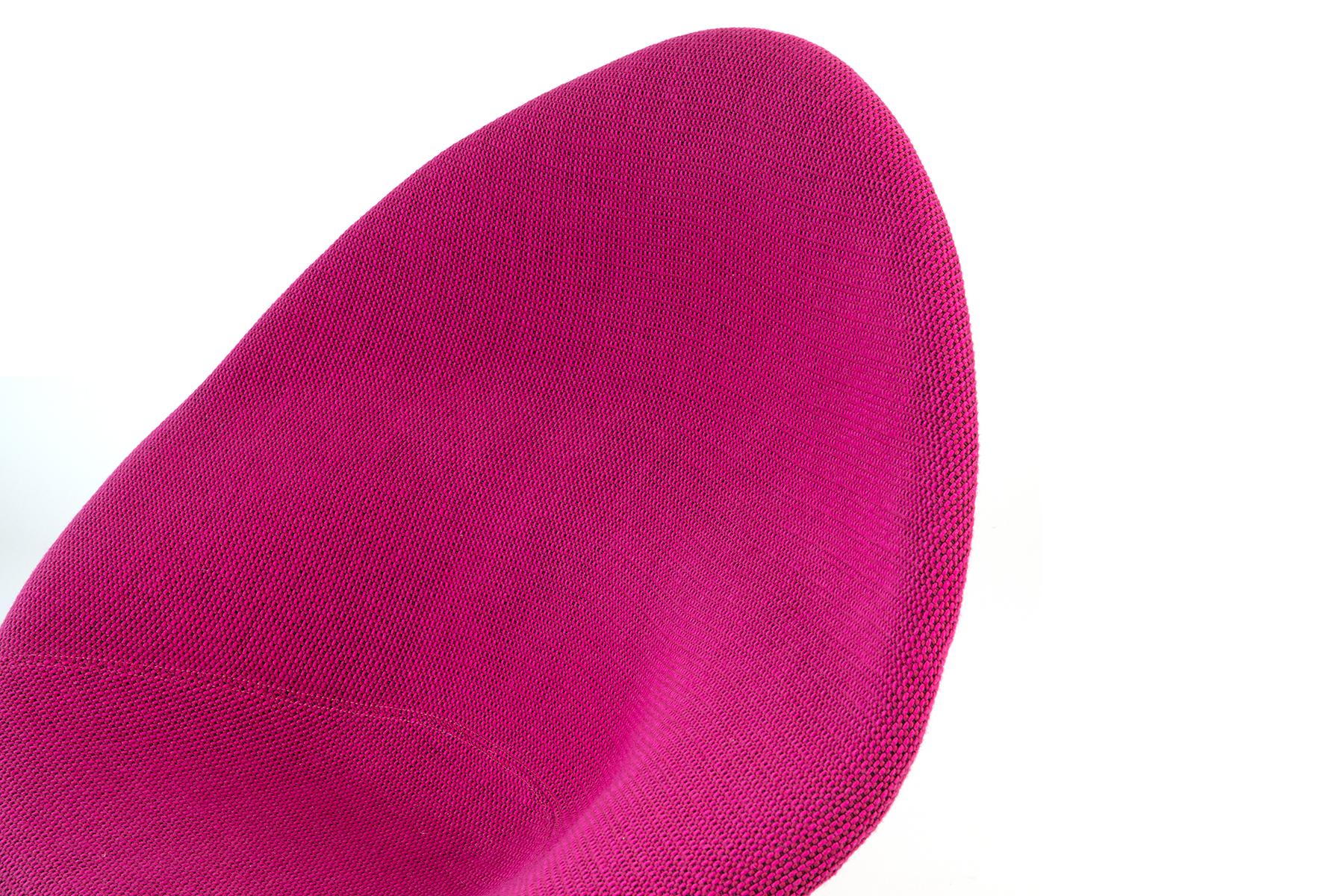 A memorable early swivel 'Globe' chair by Pierre Paulin for Artifort newly upholstered in pink Knoll Cato fabric.