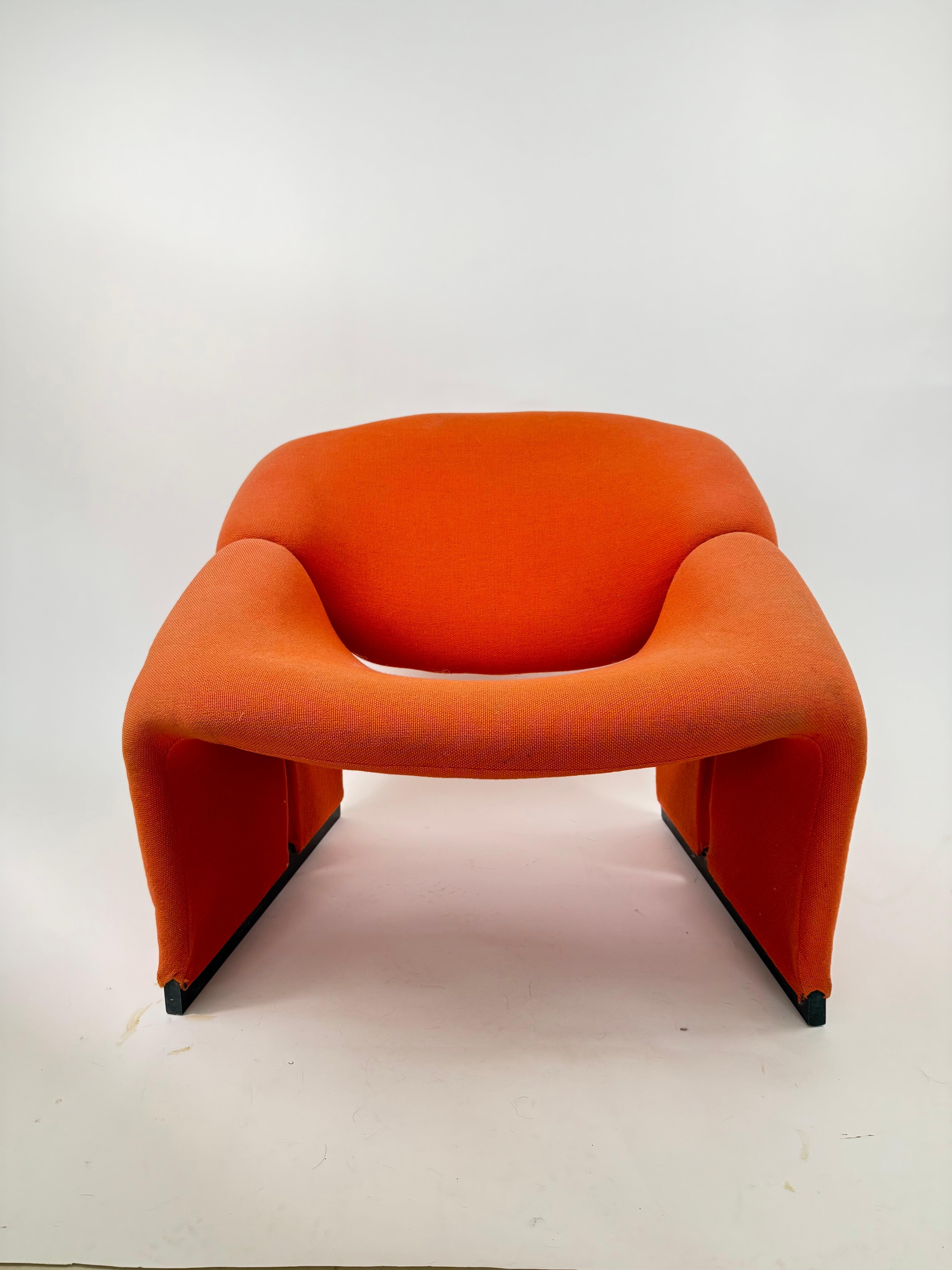 Designed by Pierre Paulin for Artifort in 1966.  The groovy chair is known for its sculptural shape and is truly an iconic form.  The first edition seems to be more collectable and features a split down the sides that runs all the way to the bottom,
