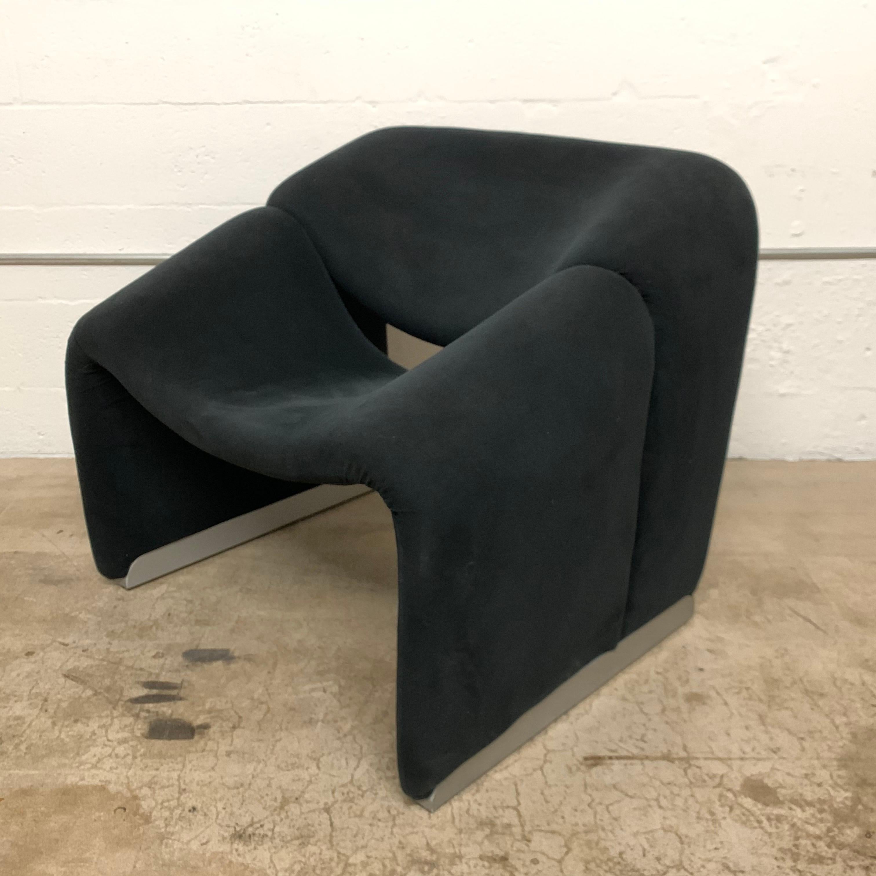 Groovy chair rendered in black ultra suede with aluminum slide bases designed by Pierre Paulin for Artifort, 1970s.