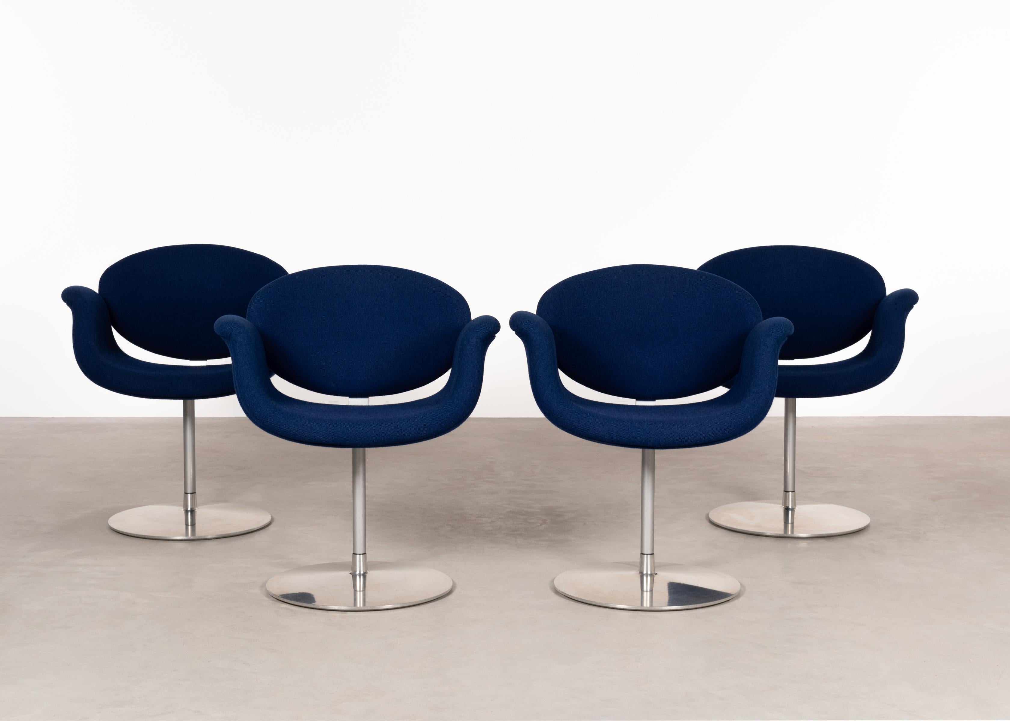 Elegant and comfortable Little Tulip dining or conference chairs designed by Pierre Paulin for Artifort. Rotating chromed disc base and blue wool fabric in very good original condition.