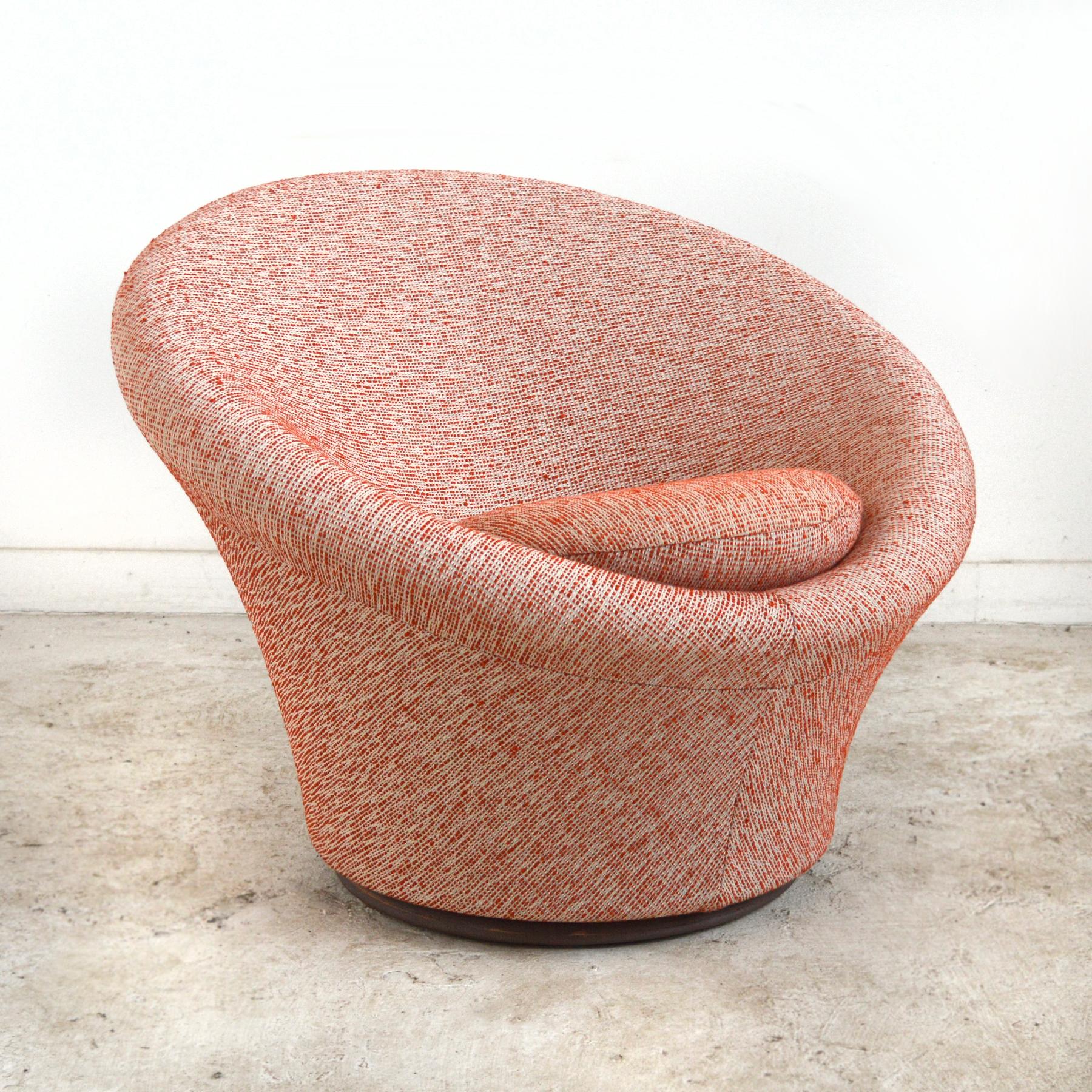 A terrific example of Paulin's organic design aesthetic, the mushroom chair sprouts from the floor and envelops the sitter. The curvy form looks beautiful from every side and has a swivel function, allowing it to easily be positioned to any angle.