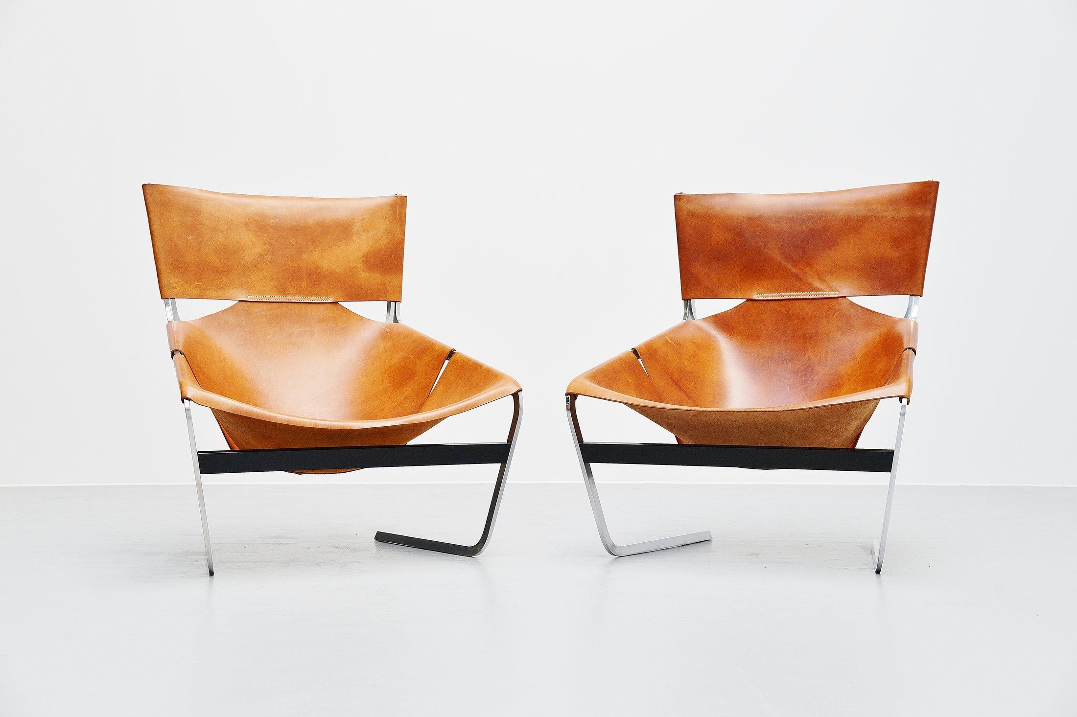 This is for a spectactular pair of F444 chairs designed by the French designer Pierre Paulin (1927-2009) and manufactured by Artifort, Holland 1963. These chairs are hard to find in general but its the first time in years I came across a pair of