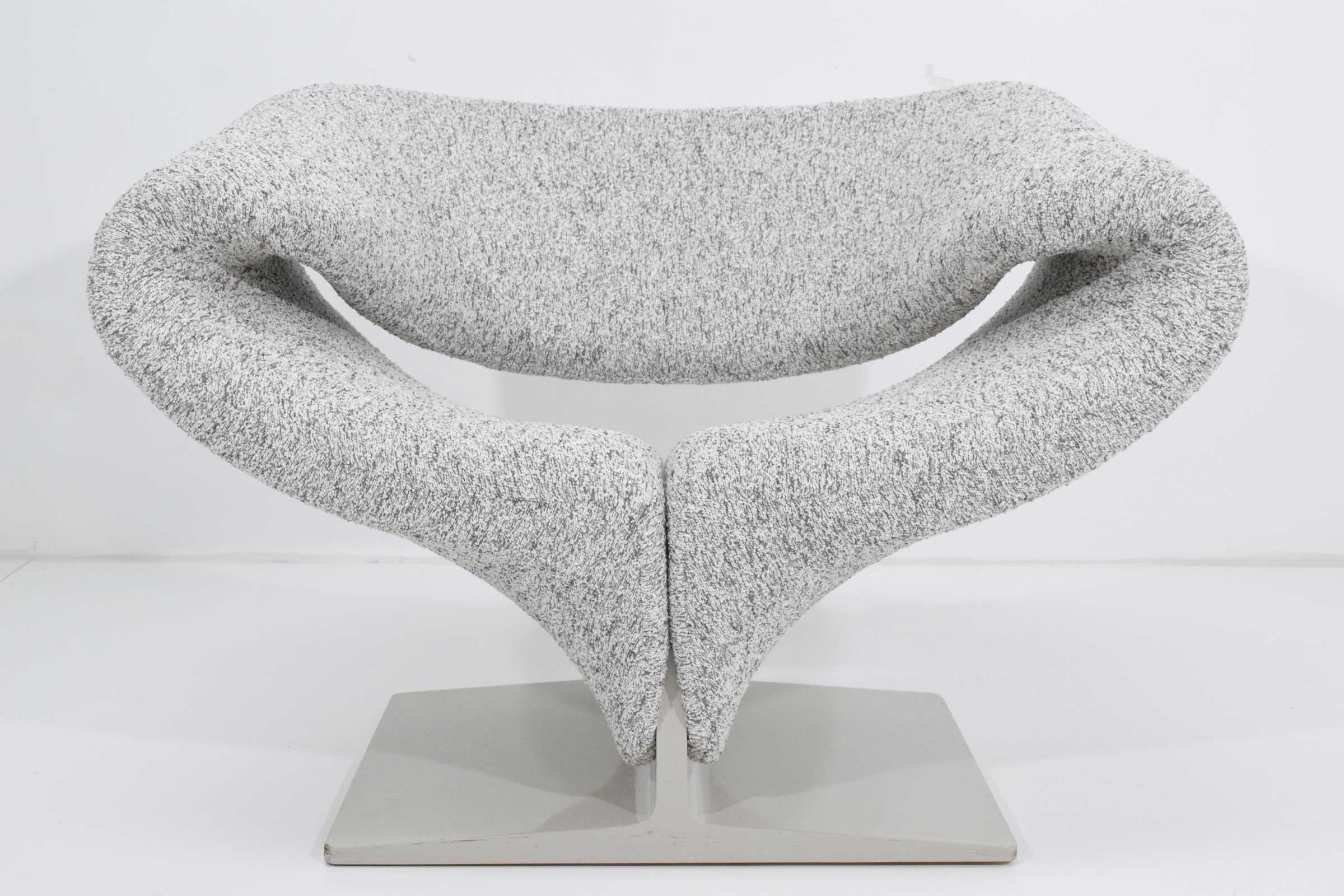 The iconic ribbon chair by Pierre Paulin designed in 1966. This chair is amazingly comfortable with high style.