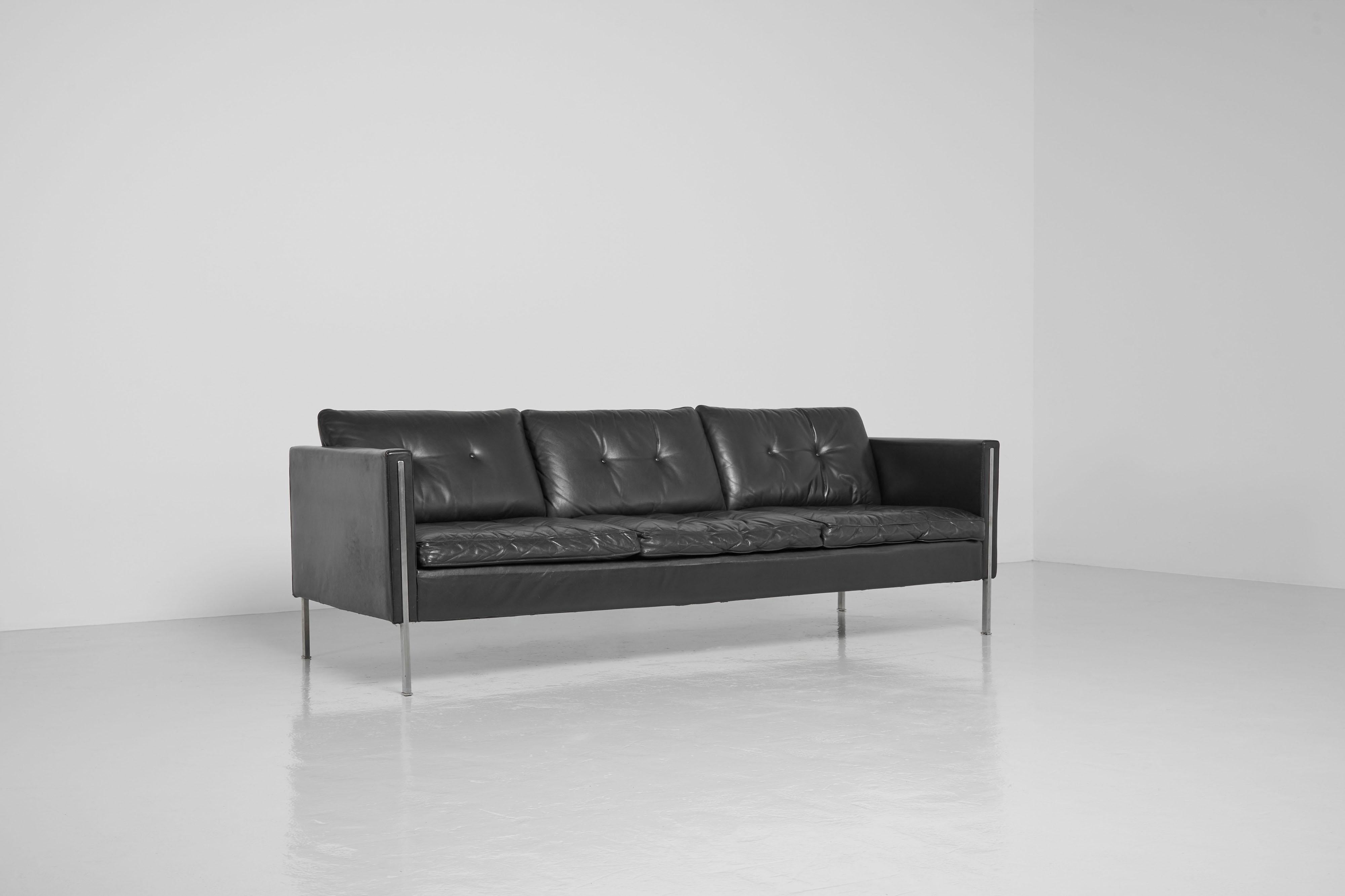 Nice minimalistic model 442/3 sofa designed by Pierre Paulin and manufactured by Artifort, The Netherlands 1962. This is for a three-seater sofa model 442/3 which is the largest from these series, a sofa in quality black leather and matt chrome