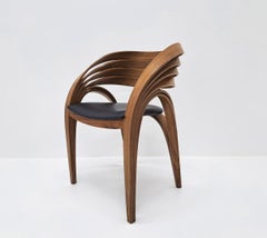 Pierre Renart American walnut Genese armchair
