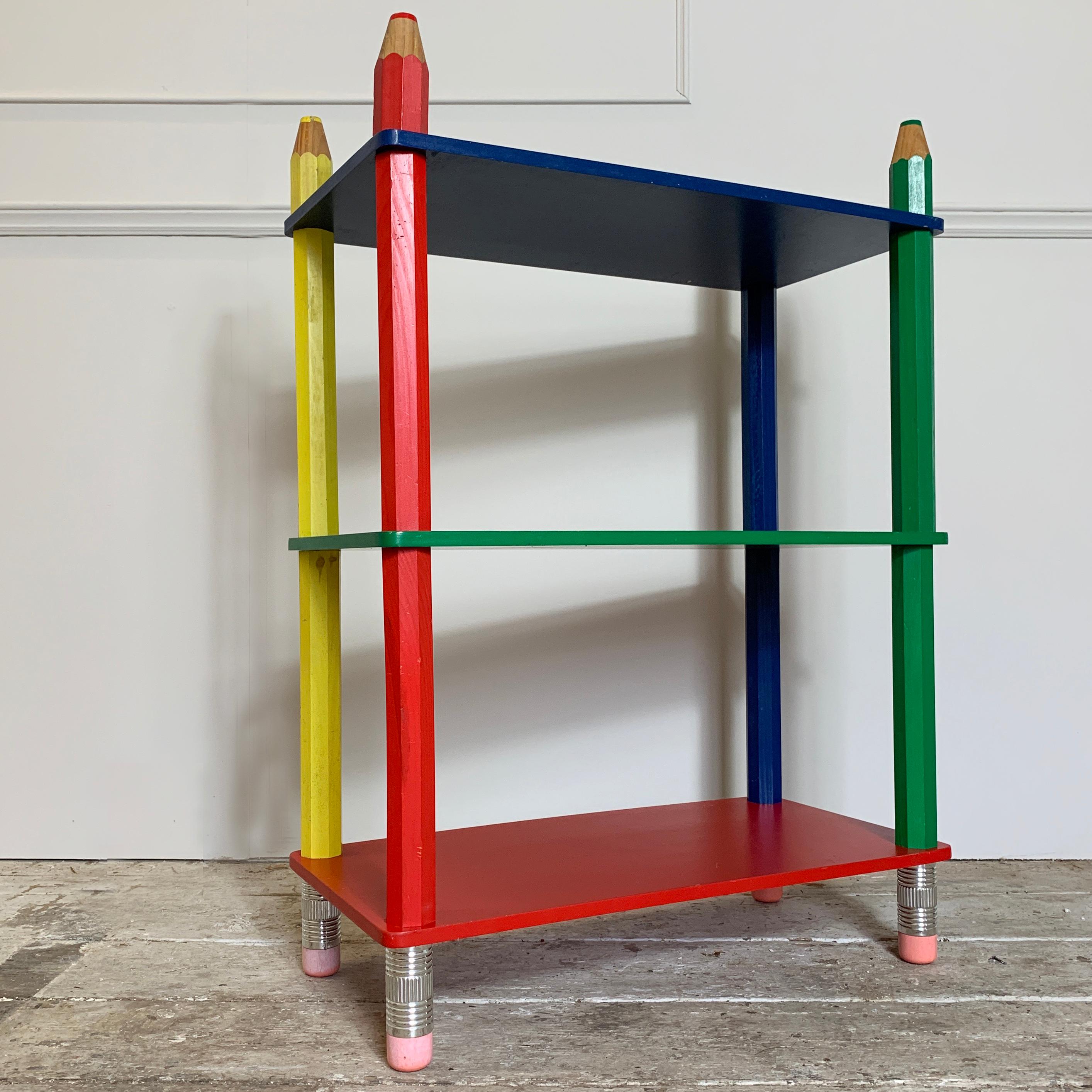 Fantastic Postmodern shelving unit in the design of oversized pencils
Attributed to Pierre Sala, France, 1980s (Model Claire Fontaine)
Great strong primary colors
There are some age related marks to the yellow pencil as shown, also a small mark