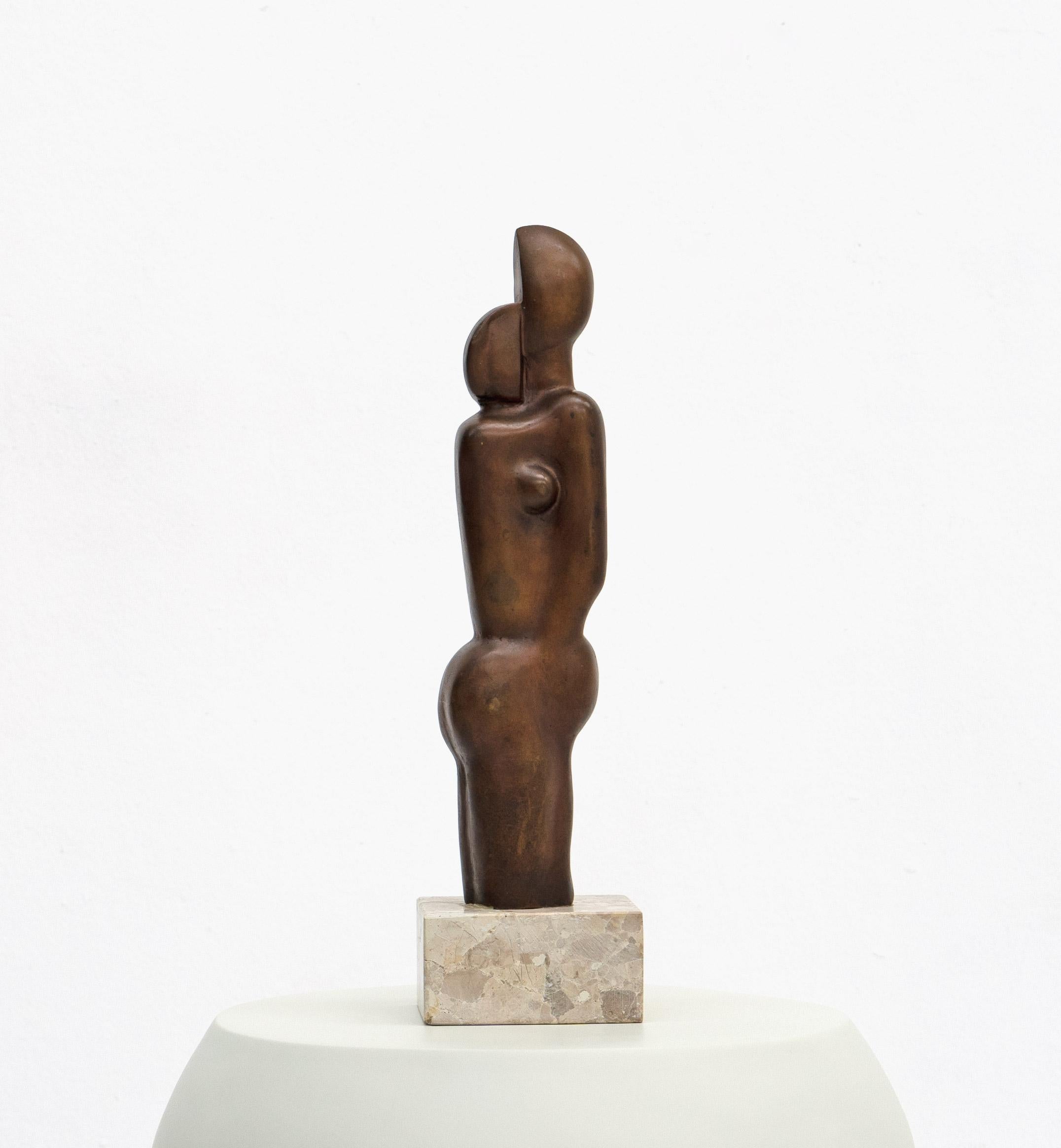 A figurative abstract bronze on a marble plinth by German Sculptor Pierre Schumann (1917 - 2011).

Schumann trained at the University of Fine Arts Hamburg and the Stuttgart Academy after which he worked as a freelance artist in Hamburg and had a