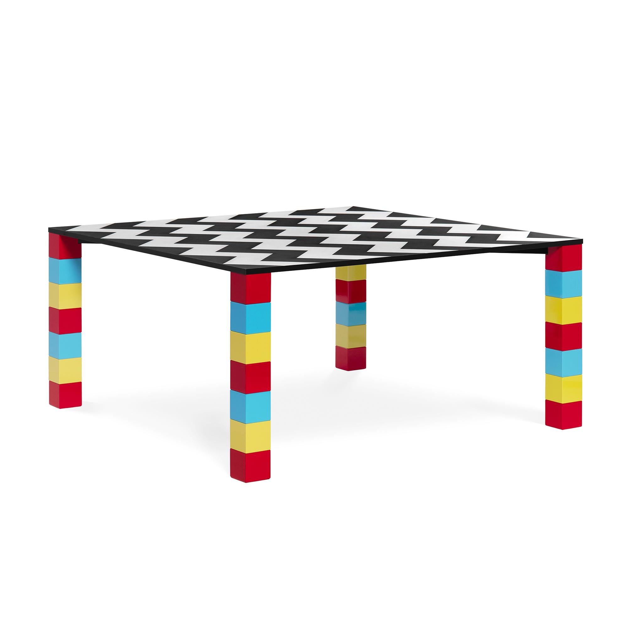 George J. Sowden
1981
Table made of lacquered wood and covered with decorative laminate, metal frame.
The surprising optical effect of Pierre is the result of the alternation of two vividly contrasting geometric patterns.
The colors and motifs