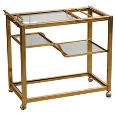 Vintage Pierre Vandel Bar Cart in Gold and Chrome with Glass Shelves, 1970s