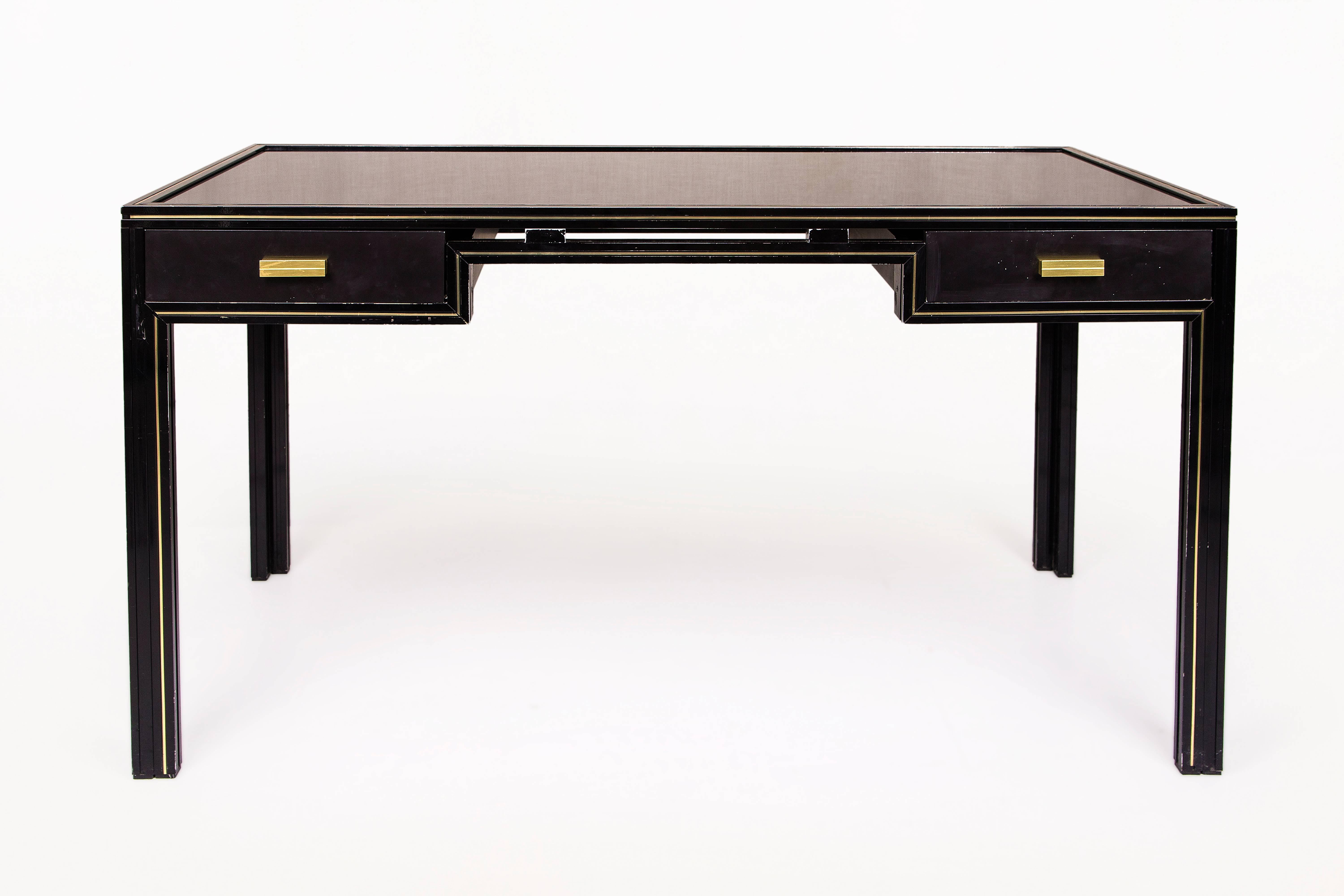 Pierre Vandel desk
Black lacquered metal and brass detailing with inlaid glass top
Signed, 
circa 1970, France 
Very good vintage condition.
