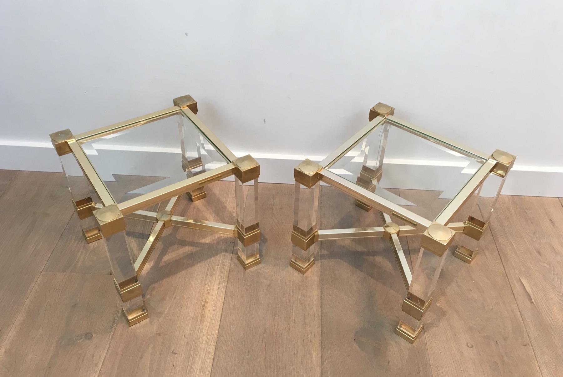 This pair of small side tables are made of square lucite legs with gold gilt aluminium. These end tables are signed by famous french designer Pierre Vandel. This is a rare model which is very small and was made around 1970's