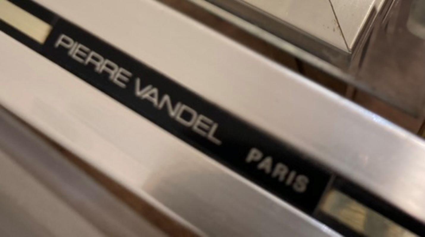 Nest of three tables in brass-plated aluminium,  or gilt brass,  with bevelled glass tops, designed by Pierre Vandel during the 1970s. Signed “PIERRE VANDEL PARIS