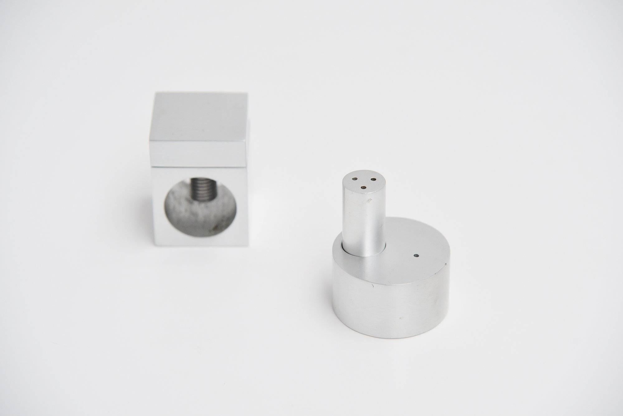 Very nice set of pepper and salt, and a nut cracker designed by Pierre Vandel for Espace de Pierre Cardin, Paris, 1970. These items are made of solid aluminum and are fantastically shaped and useful as well. The pepper and salt especially the nut