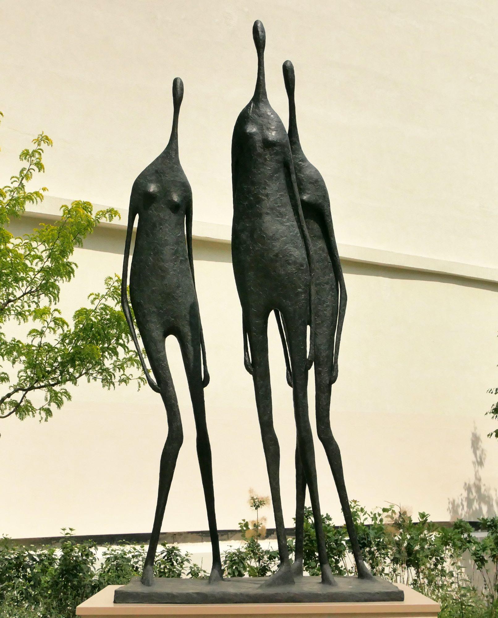 3 Monumental Standing Figures is a bronze sculpture by French contemporary artist Pierre Yermia, dimensions are 320 × 150 × 130 cm (126 × 59.1 × 51.2 in).  
The sculpture is signed and numbered, it is part of a limited edition of 8 editions + 4