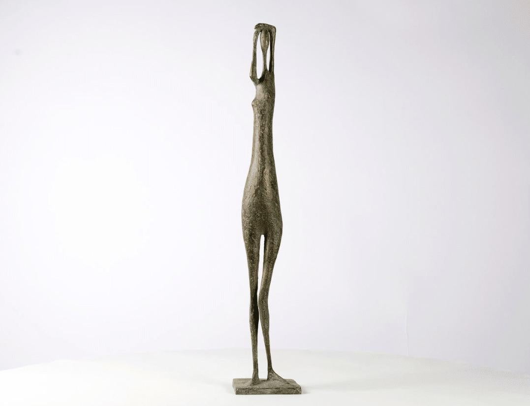 Arms Raised Standing Figure VIII is a bronze sculpture by French contemporary artist Pierre Yermia, dimensions are 60 × 11 × 9 cm (23.6 × 4.3 × 3.5 in). 
The sculpture is signed and numbered, it is part of a limited edition of 8 editions + 4