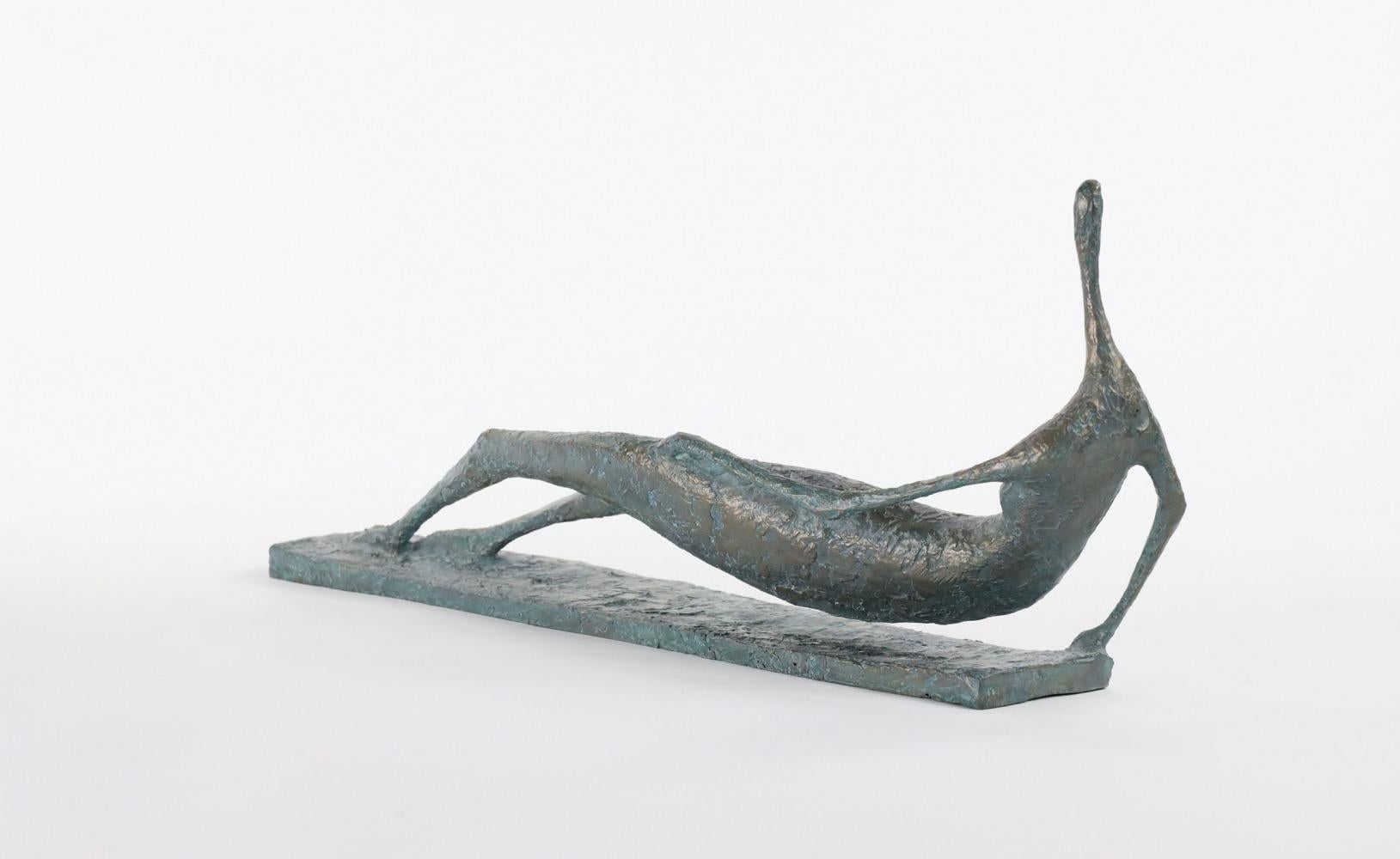 Lying Figure V (Figure allongée V) is a sculpture by French contemporary artist Pierre Yermia. 
Bronze, 22 cm × 53 cm × 9 cm.  Edition of 8 copies and 4 artist's proofs. Each cast is signed and numbered.
This elongated figure to all appearances
