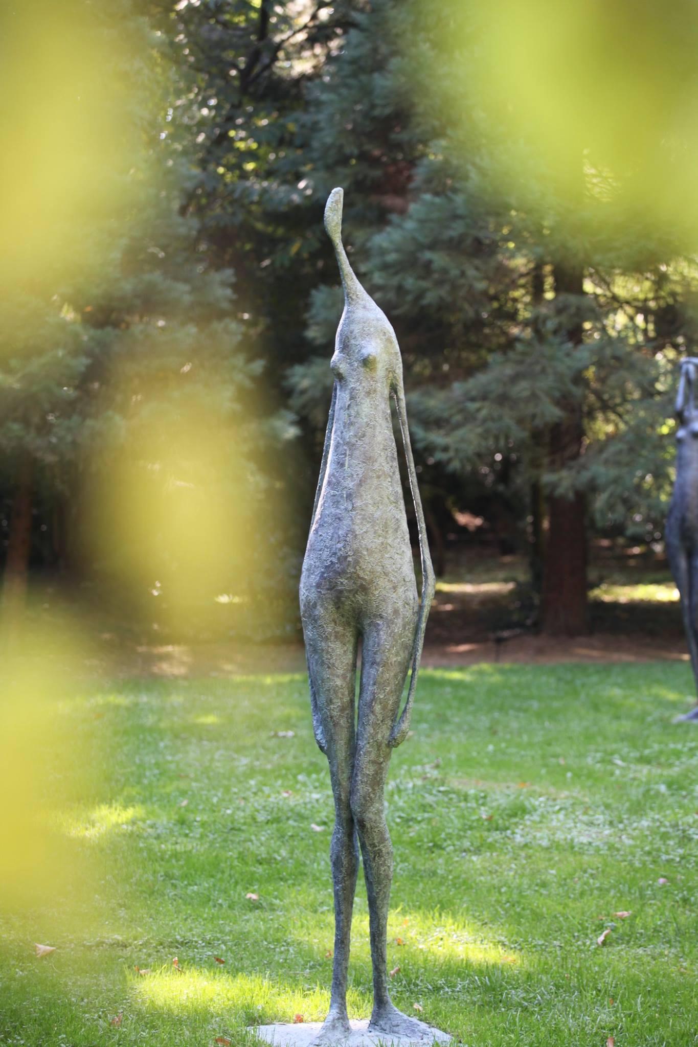 Monumental Standing Figure I is a bronze sculpture by French contemporary artist Pierre Yermia, dimensions are 250 × 60 × 60 cm (98.4 × 23.6 × 23.6 in).  
The sculpture is signed and numbered, it is part of a limited edition of 8 editions + 4