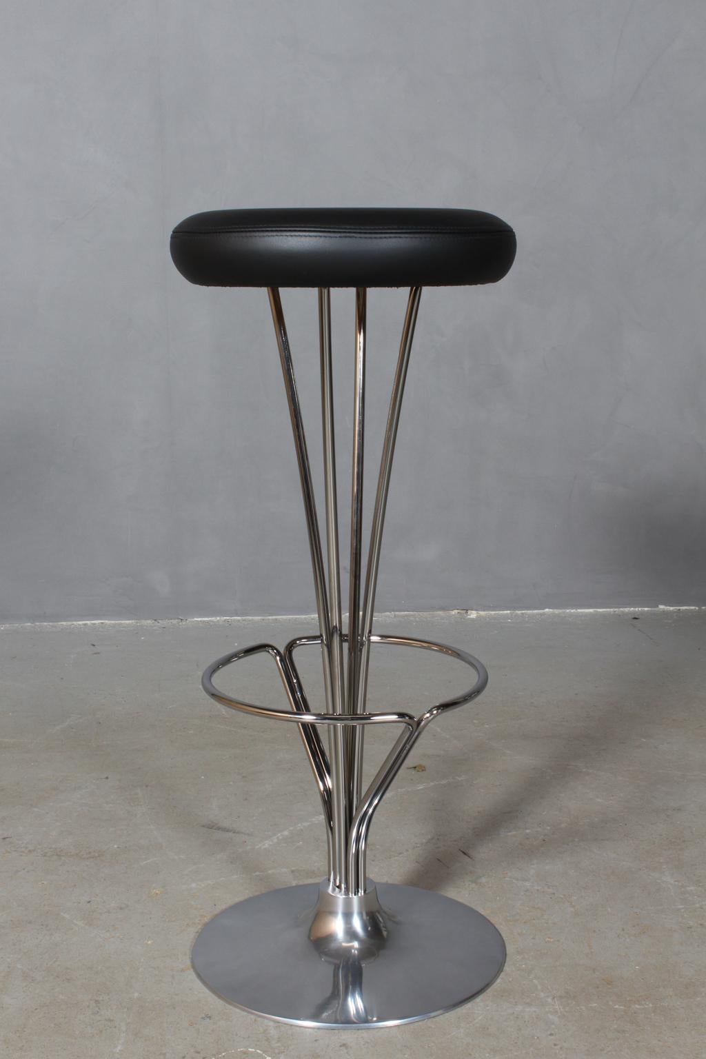 Piet Hein bar stools original upholstered with black leather.

Piet Hein base.

Made by Piet Hein, brand new in box.