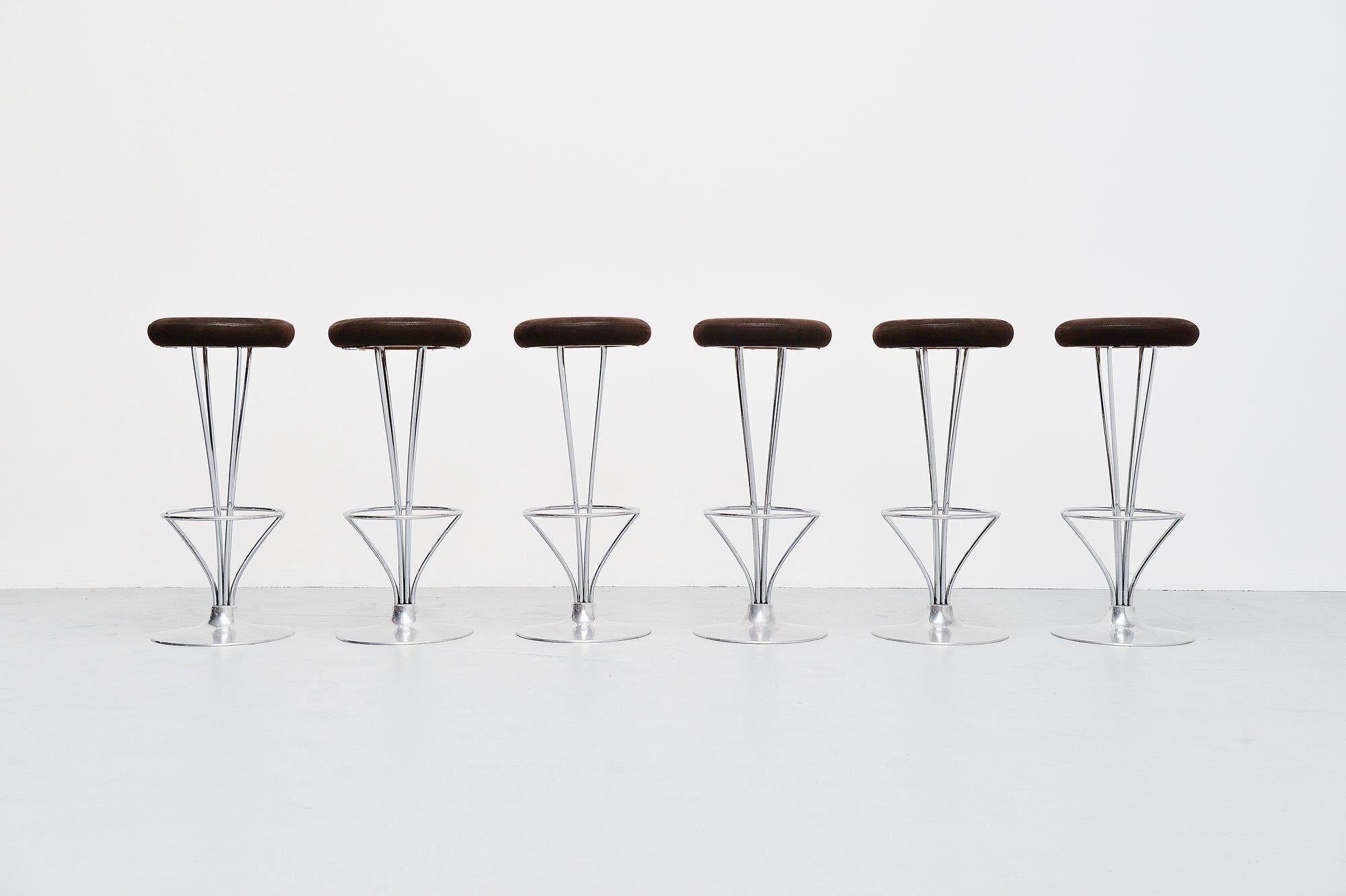 This is for a very nice set of six bar stools, designed by Piet Hein for Fritz Hansen, Denmark 1965. These stools have chrome-plated frames and a brushed aluminium base. These are upholstered in brown suede and it has a nice patina from age and