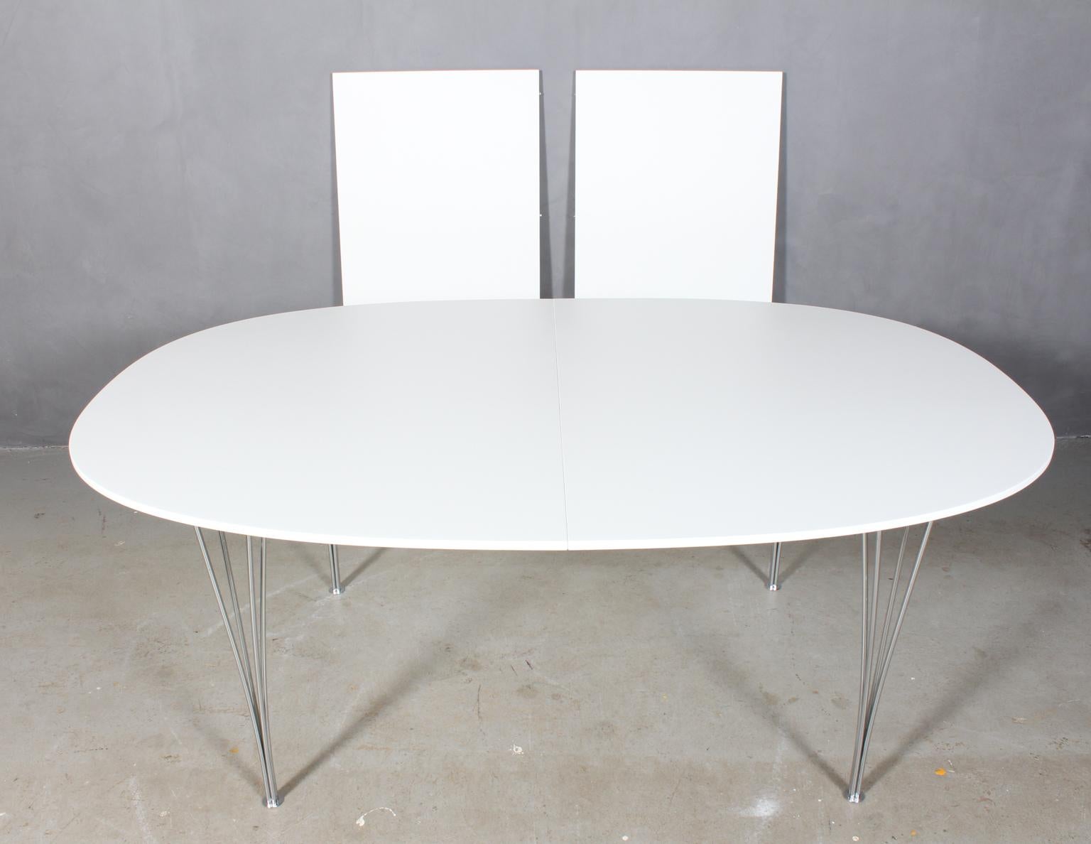 Piet Hein & Bruno Mathsson dining table with new professional lacquered white plate. 

Two Extension leaf of 60 cms.

Legs of chromed metal.

Model Super Elipse, made by Fritz Hansen.

This is one of the most iconic tables in Scandinavia.