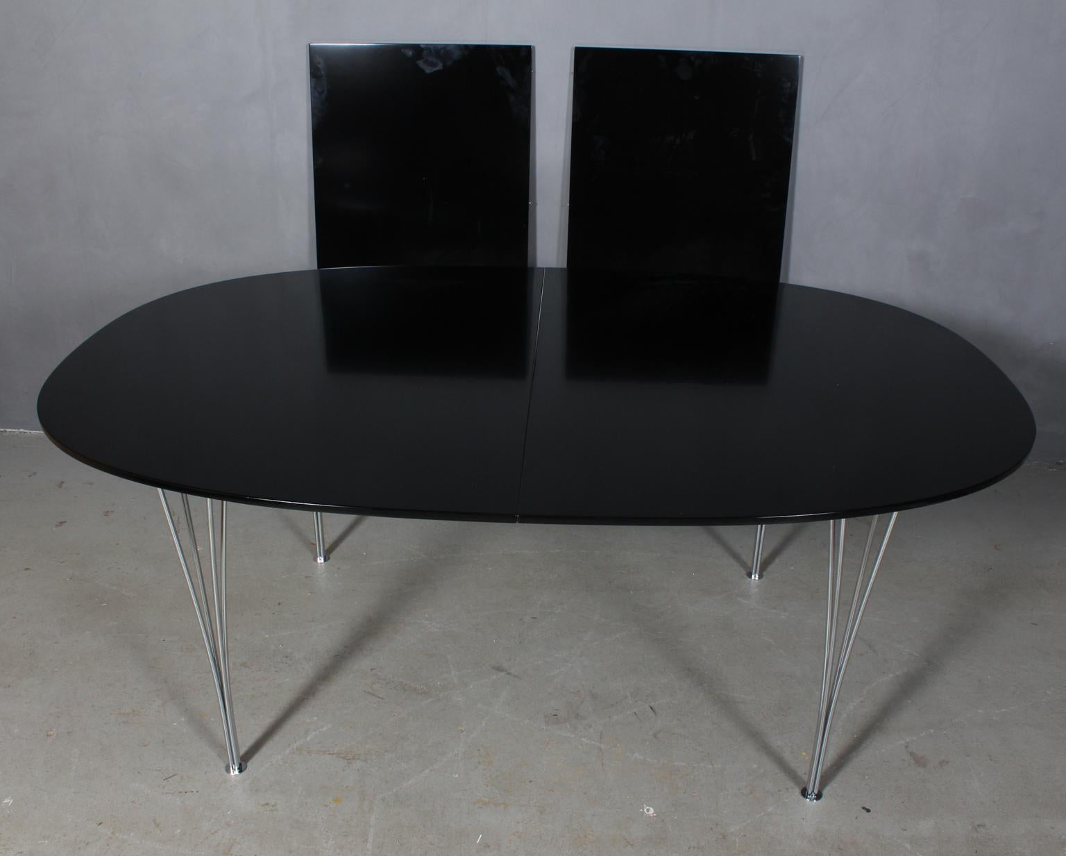 Piet Hein & Bruno Mathsson dining table new laquered black.


Two extension leaf of 60 cms.

Legs of chromed metal.

Model Super Elipse, made by Fritz Hansen.

This is one of the most iconic tables in Scandinavia.