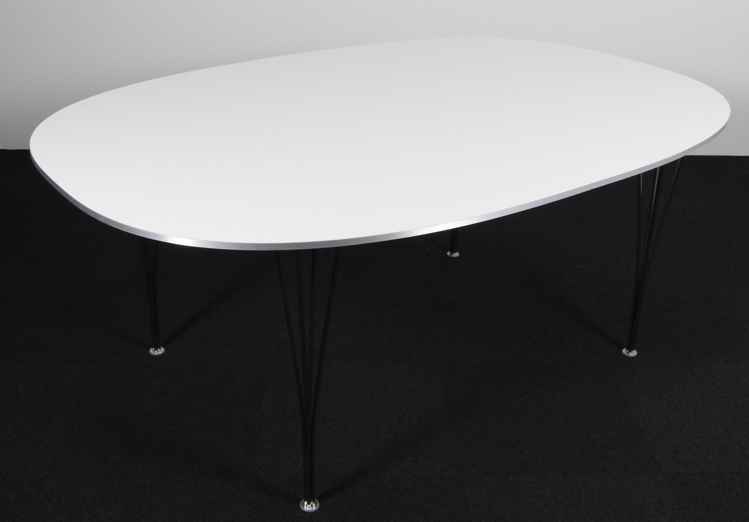 Piet Hein & Bruno Mathsson dining table original Fenix laminate.


Two extension leaf of 60 cms.

Legs of chromed metal.

Model Super Elipse, made by Fritz Hansen.

This is one of the most iconic tables in Scandinavia.