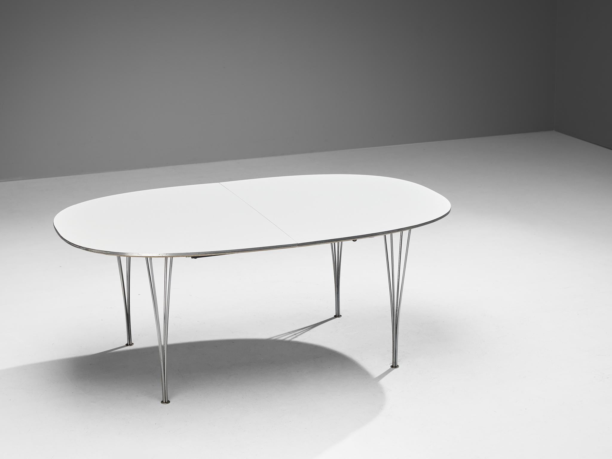 Extendable dining table, beech, steel, by Piet Hein, Arne Jacobsen & Bruno Mathsson for Fritz Hansen, Denmark, design 1968. 

Dining table in lacquered beech and steel. This version is produced by Fritz Hansen in the 1980s. This table was designed