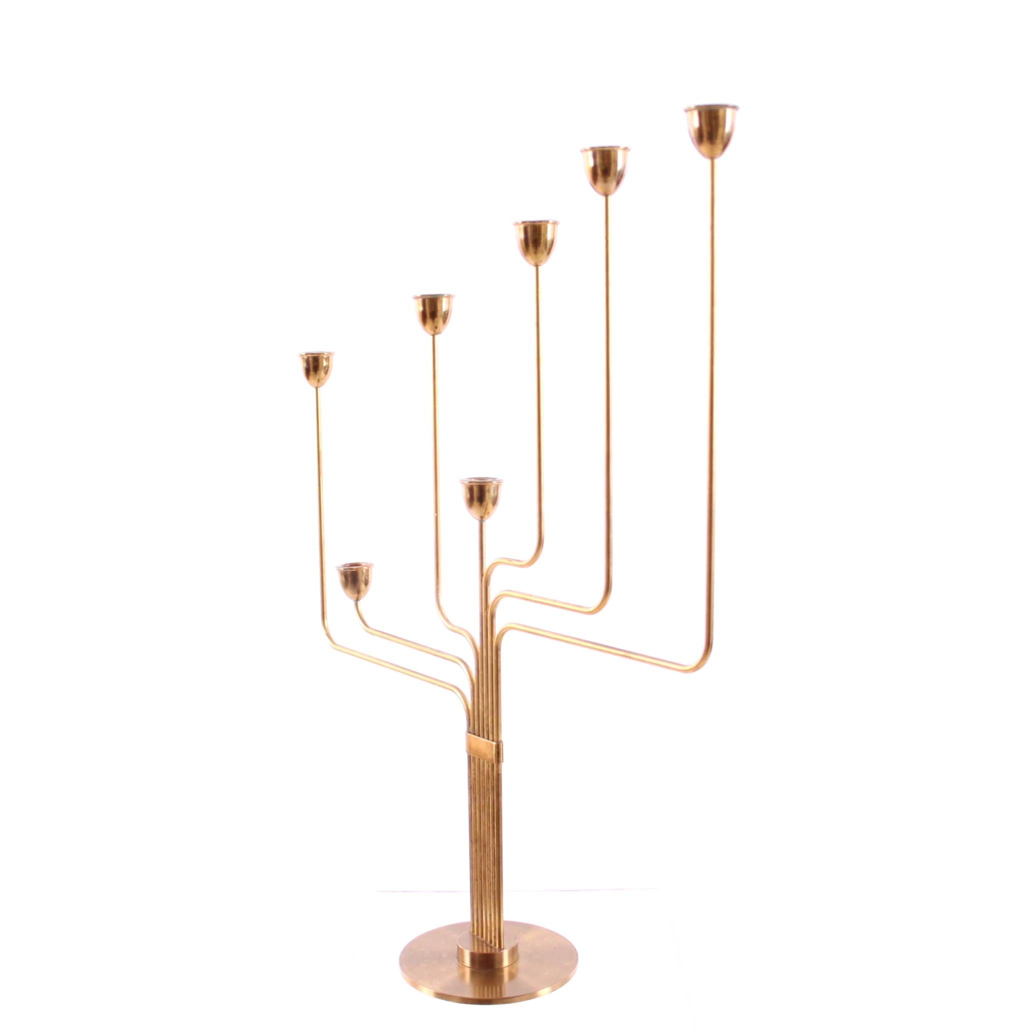 PIET HEIN - SCANDINAVIAN MODERN

An exceptionally beautiful candelabrum by the Danish modernist and designer, poet, mathematician and architect Piet Hein. 

The candelabrum has seven arms and in solid brass. It was named 