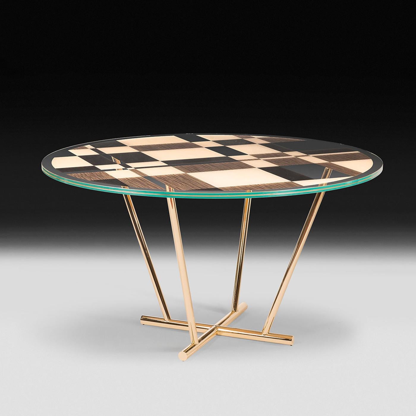 Inspired by the iconic paintings by Piet Mondrian, this table is a refined addition to a modern interior. Its elegant silhouette is crafted of metal with a resplendent 24-karat gold coating and features a crossing base from which four legs stem in