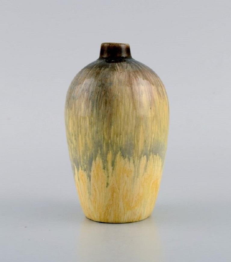 Pieter Groeneveldt (1889-1982), Dutch ceramicist. Unique vase in glazed ceramics. 
Beautiful glaze in yellow and black shades. Mid-20th century.
Measures: 12 x 7.5 cm.
In excellent condition.
Stamped.

Pieter Groeneveldt was a Dutch artist and