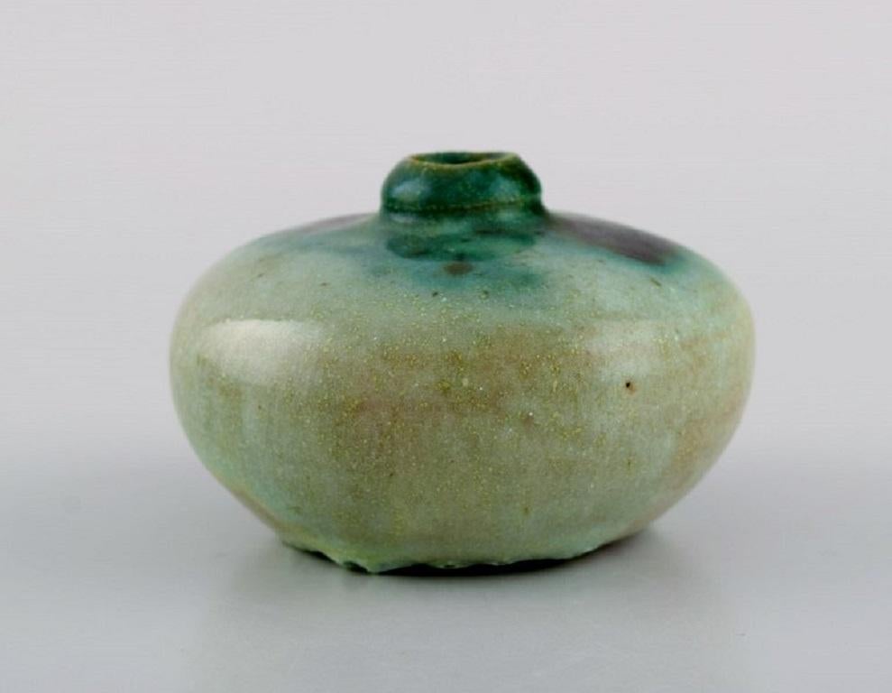 Pieter Groeneveldt (1889-1982), Dutch ceramicist. Unique vase in glazed ceramics. 
Beautiful glaze in shades of blue-green. Mid-20th century.
Measures: 8.5 x 5.5 cm.
In excellent condition.
Stamped.

Pieter Groeneveldt was a Dutch artist and