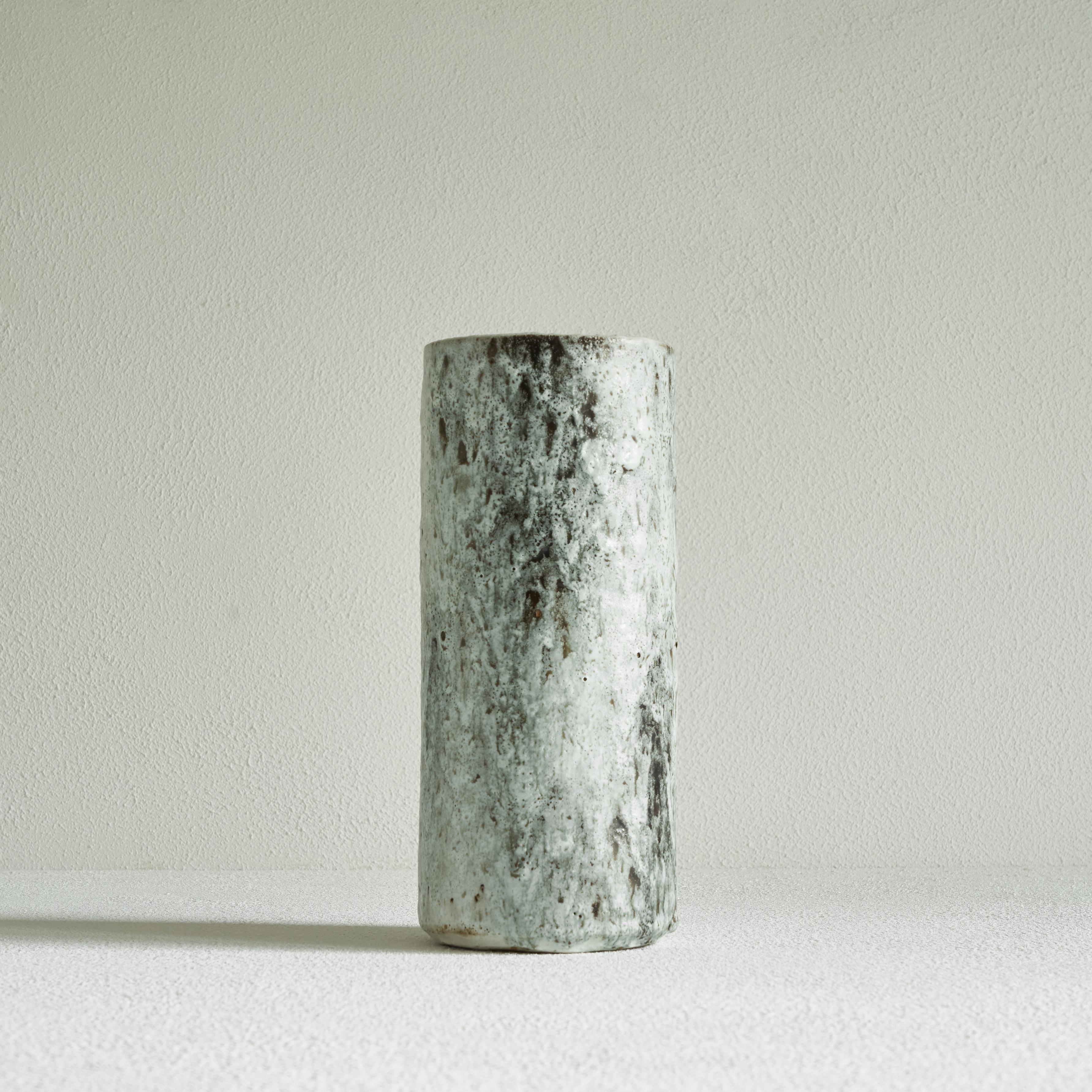 Pieter Groeneveldt Large Studio Pottery Vase, The Netherlands, mid 20th century.

Beautiful and large midcentury Studio Pottery vase by pottery artist Pieter Groeneveldt. It features a simple yet very elegant shape and a wonderful rough and rich