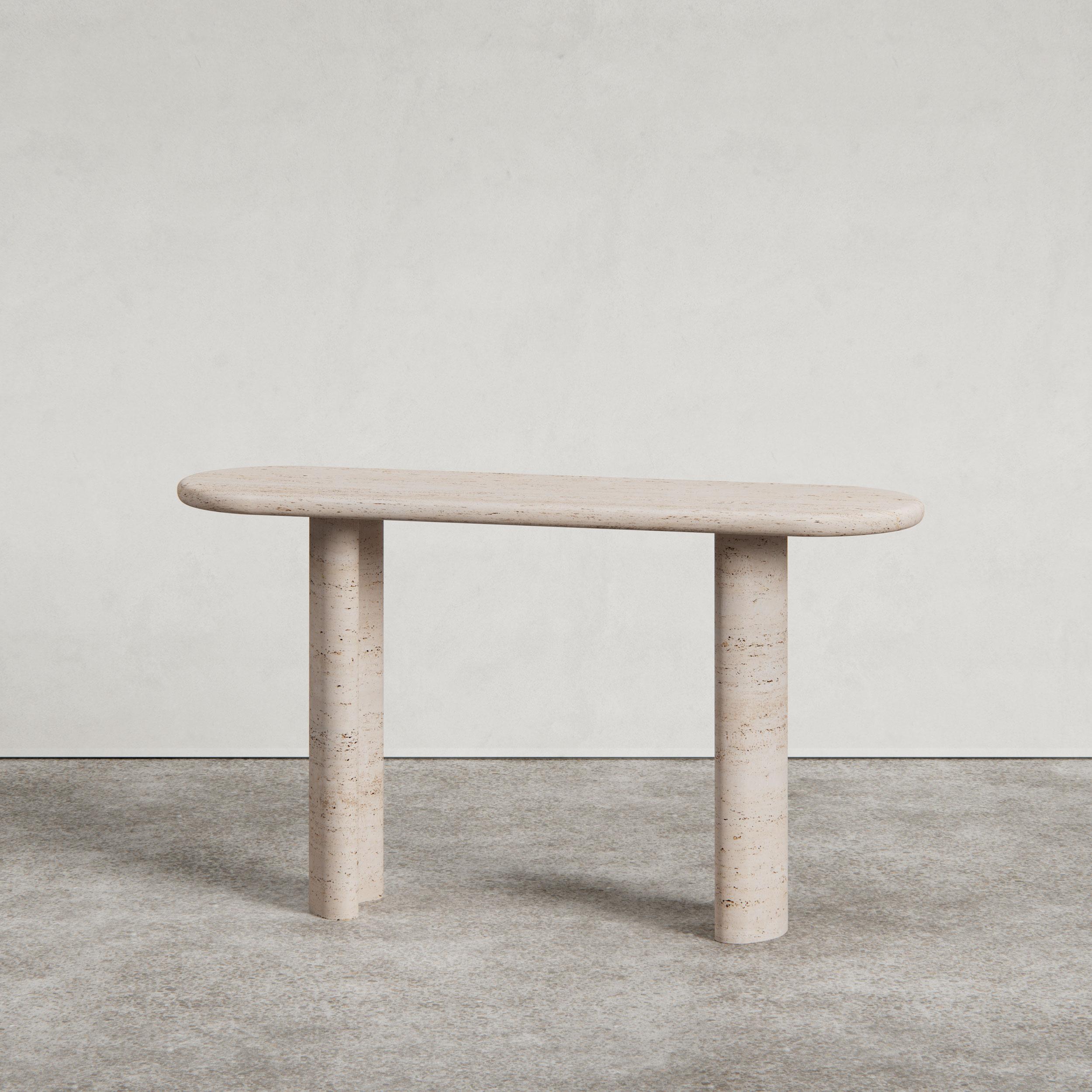 Introducing the Pietra Console; a new addition to the Pietra collection.

Designed by Just Adele. This design is carved from a single block of Italian natural stone to create organic curves and kidney-shaped legs. Available in Viola Monet and