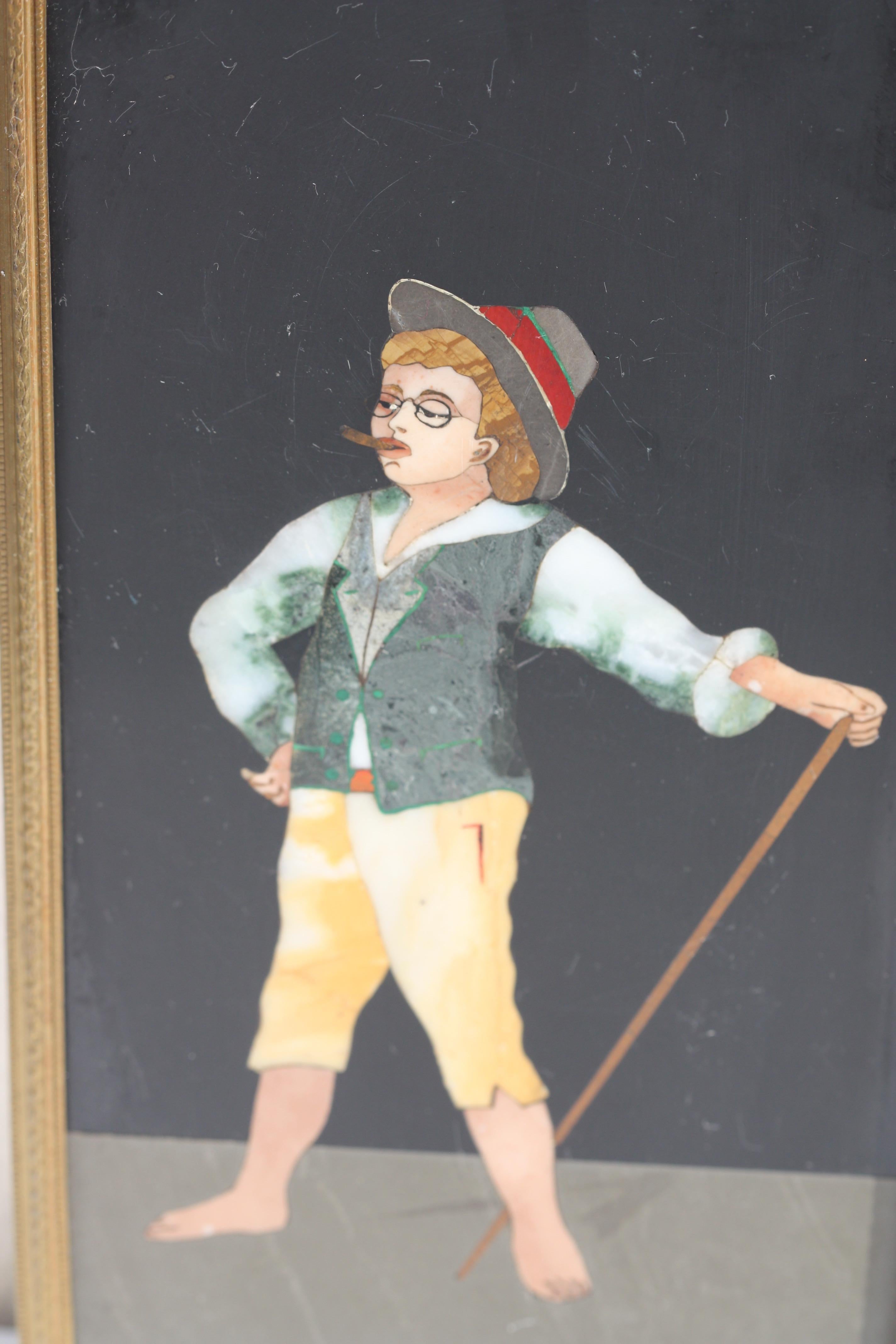 Marmortafel mit Pietra-dura-Einlage
Italienisch, 20. Jahrhundert
Mit eingeschnittener 3110/220S. 
Rechteckige Form, die einen kleinen Jungen darstellt, der erwachsen spielt. 
Maße: 9.25 in. by 4.75 in. (23,49 cm. x 12,06 cm.).
