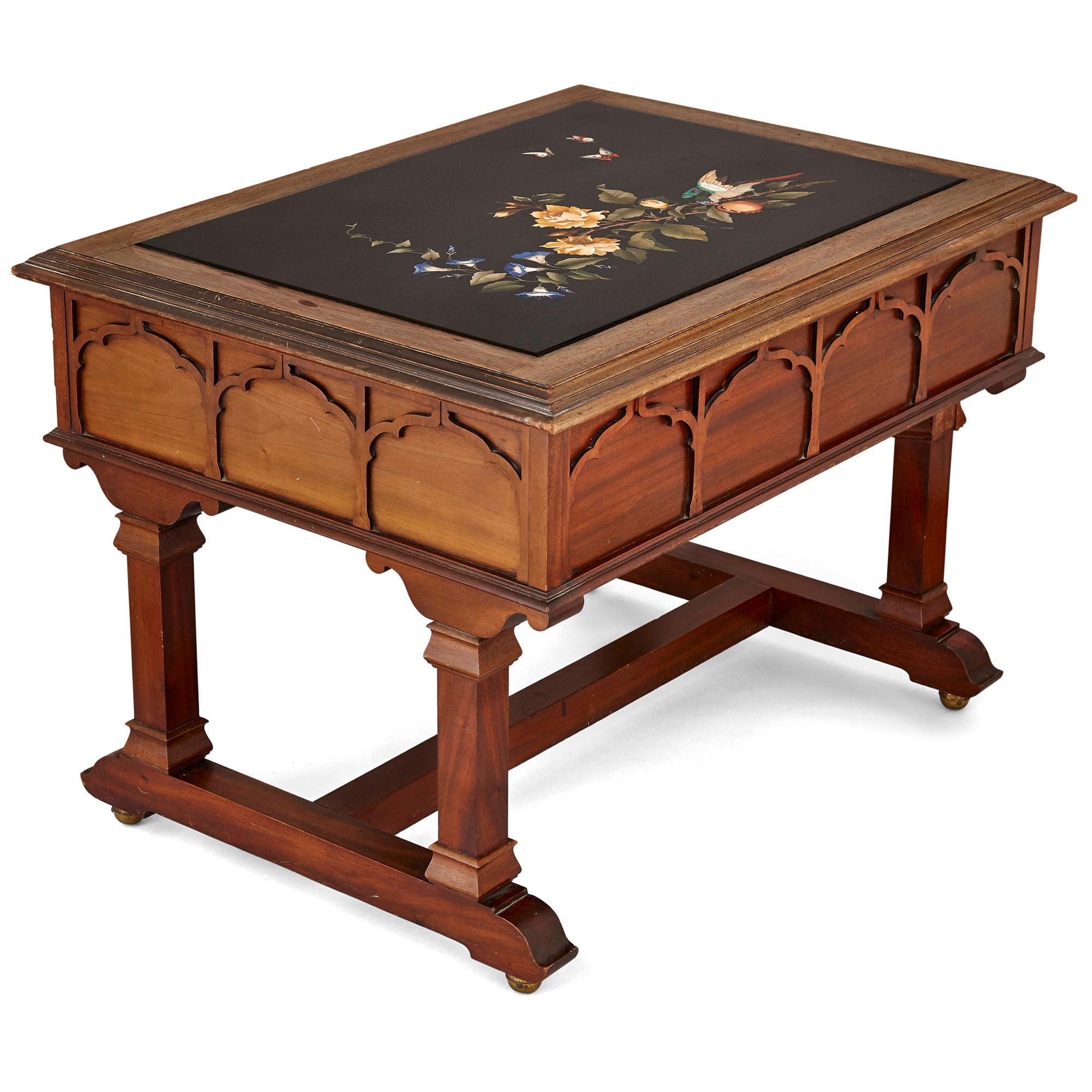 Pietra Dura inlay Italian coffee table
Italian, 19th century
Measures: Height 59cm, width 83cm, depth 63cm

This highly unusual coffee table is set with an exceptionally beautiful Pietra Dura top. The Pietra Dura panelled top has been expertly