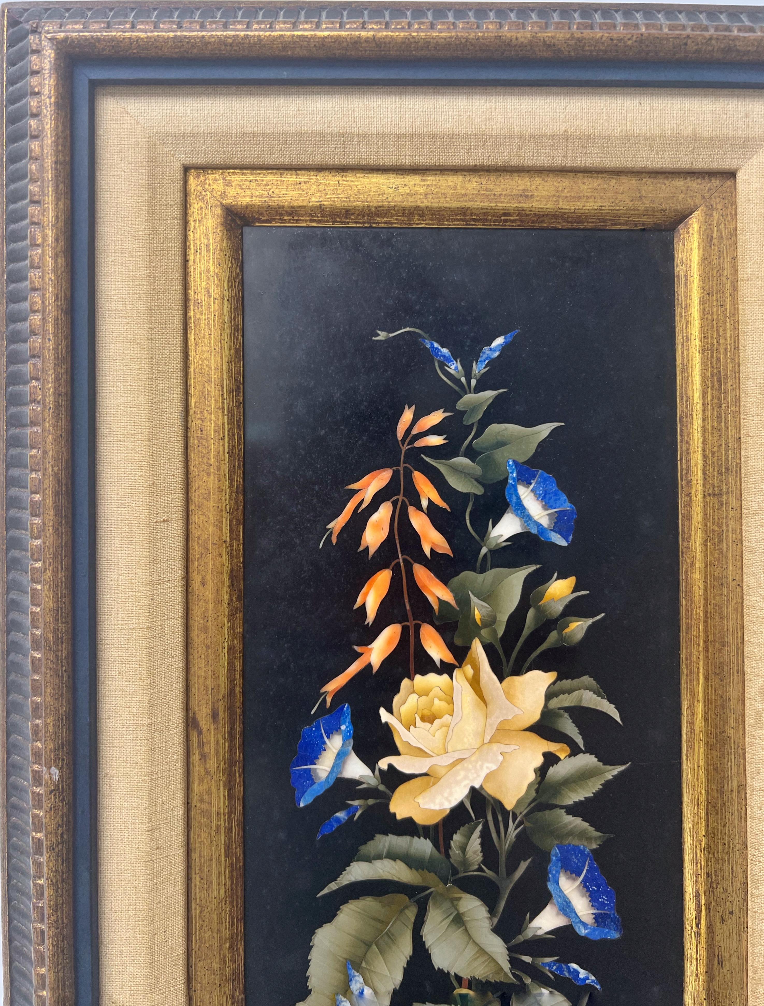 A large pietra dura plaque depicting flowers in a natural arrangement. The detail is exquisite. The natural coloration and tones of the stones have been used to achieve a realistic effect with depth and volume. plaque itself is 14.5