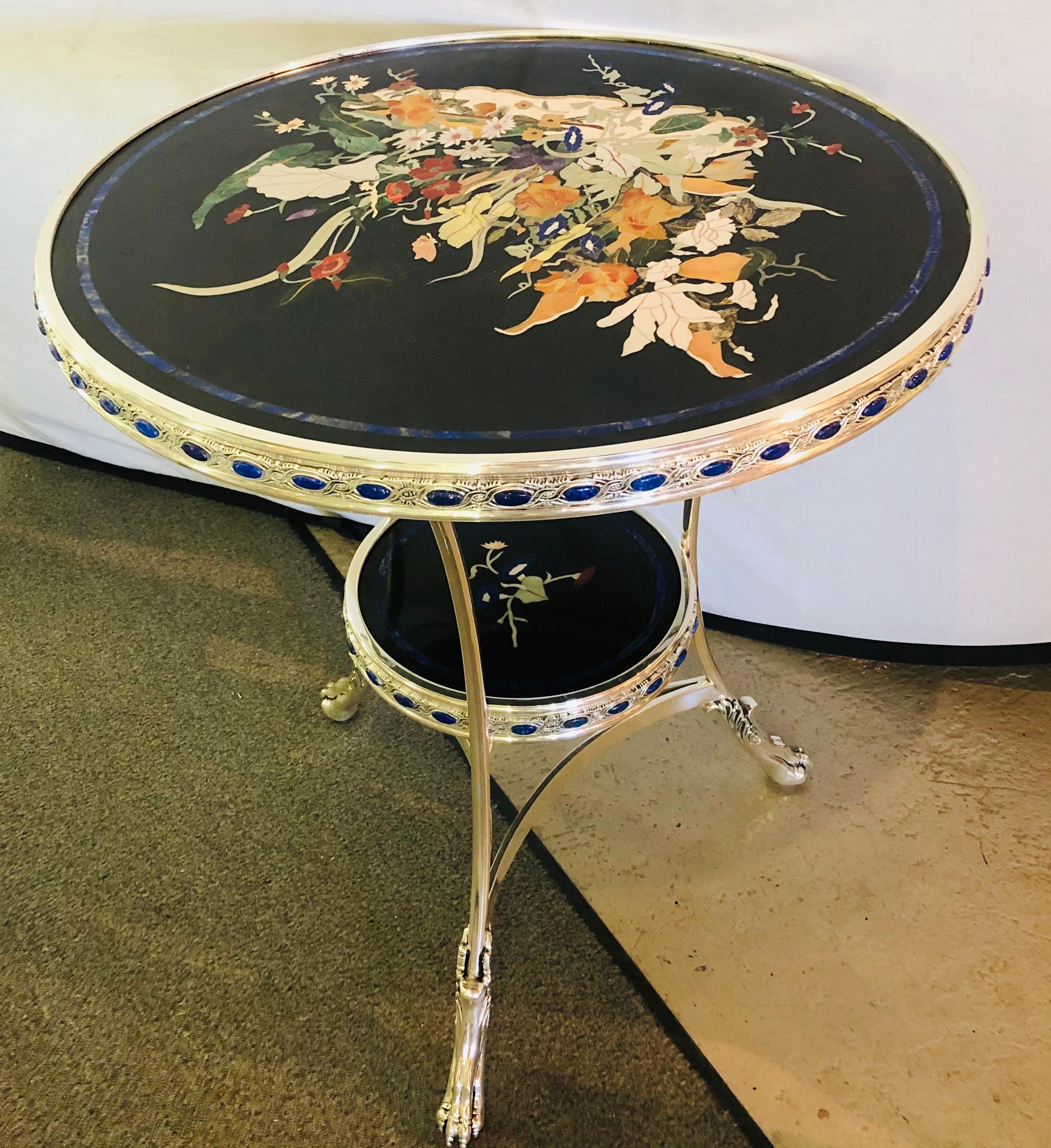 Pietra Dura marble-top silver metal based end, Bouilliotte, Gueridon tables. A fine pair of silver metal based end or side tables in the Italian finish. Having two pietra dura shelves on a strong and sturdy base these tables are simply stunning.
 