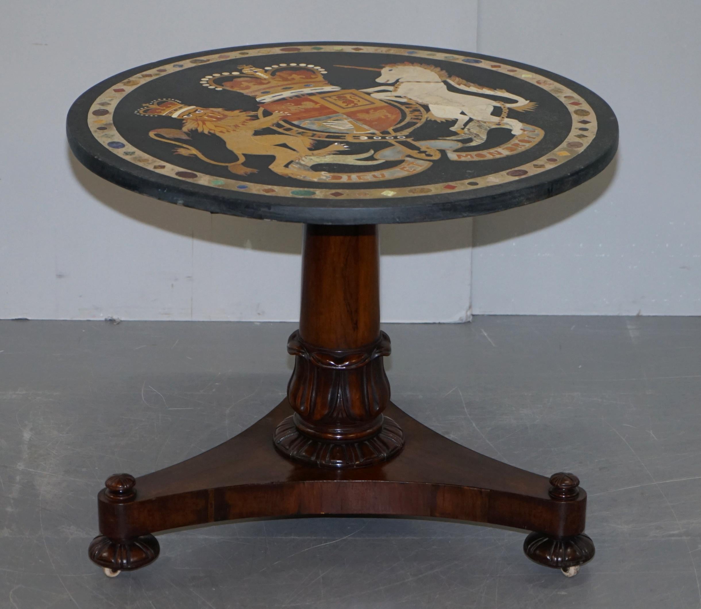 Wimbledon-Furniture

Wimbledon-Furniture is delighted to offer for sale this stunning fully restored circa 1860 Pietra Dura Specimen marble and slate occasional centre table with large armorial crest coat of arms sitting on a circa 1830 William IV
