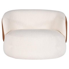 "Pietra" Curved Swivel Armchair Upholstered in Bouclé Fabric