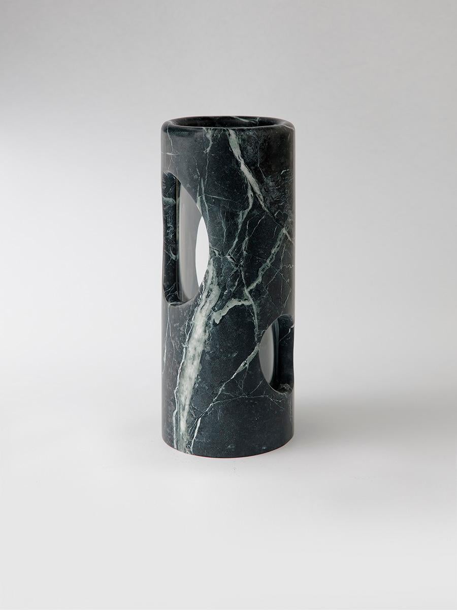 Evoking the organic architecture of Australian coastlines, the Pietra Vase features extractions modelled from hand-cast forms. An innovative vessel that connects nature and craftsmanship, the peek-a-boo cutouts incorporate flashes of green from