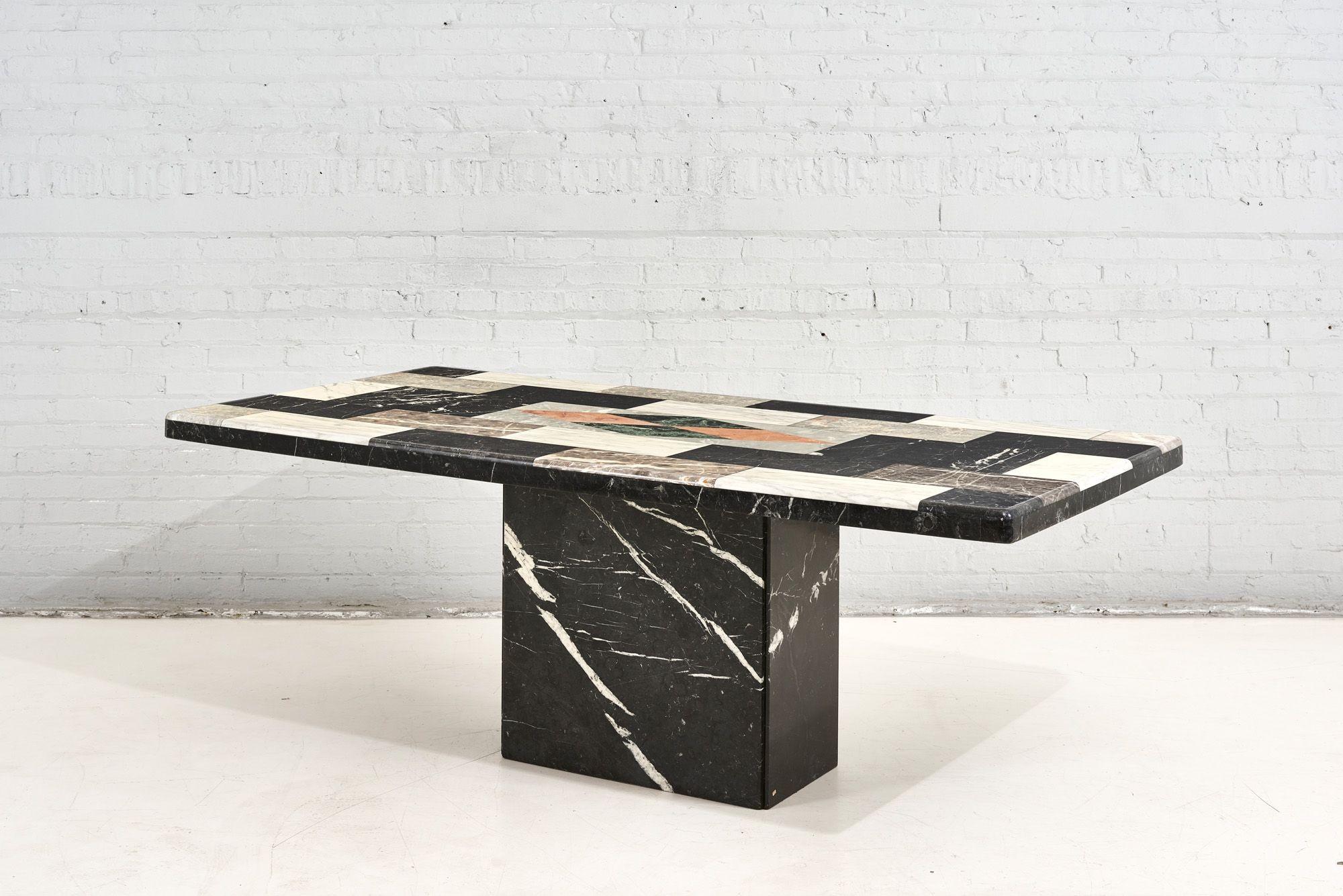 Pietre Dure dining table w/ black marble base, 1960. Table top is made of multiple colors of marble. Done in Pietre Dure technique using inlayed marble to create this piece of art.