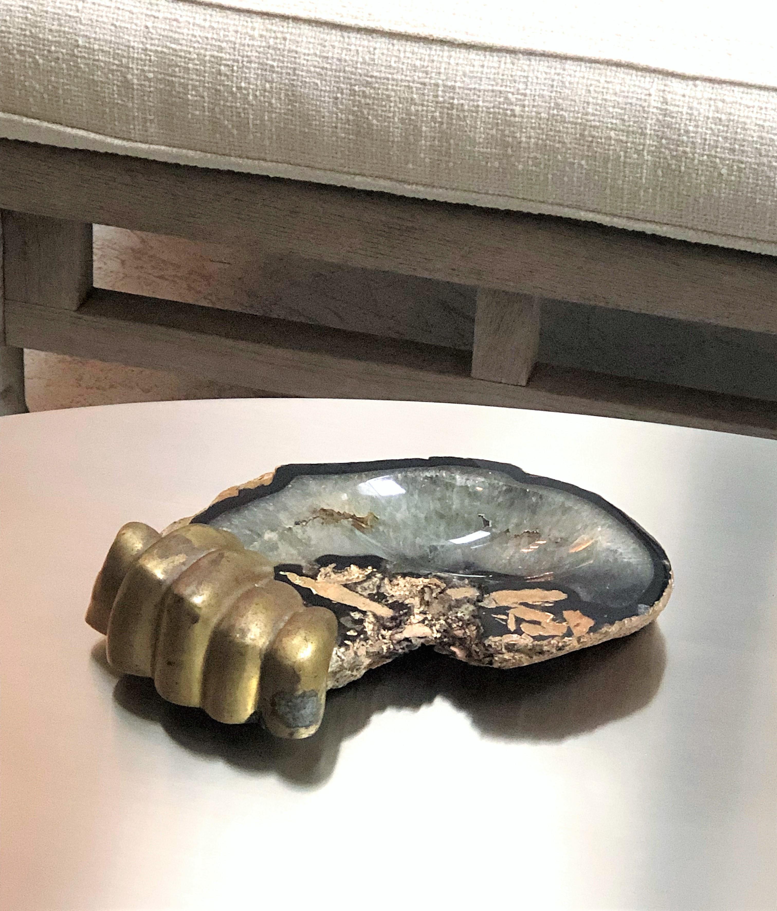 A rare vintage 1970s tray or bowl by artist Pietrina Checcacci. A larger than life-size bronze hand holds the freeform agate slab. Surrealist object by an outstanding artist.