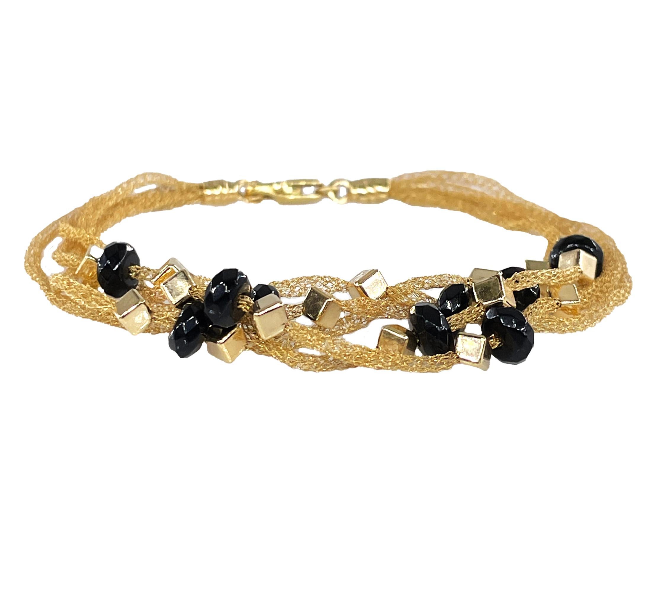 This Vintage PIETRO BALESTRA bracelet transports joy, rhythm, creativity and color from Italy to the world of jewelry with uninhibited designs, fun, elegance and fashion.
A woven mesh and beaded vintage Bracelet by PIETRO BALESTRA, from the 'l'Oro