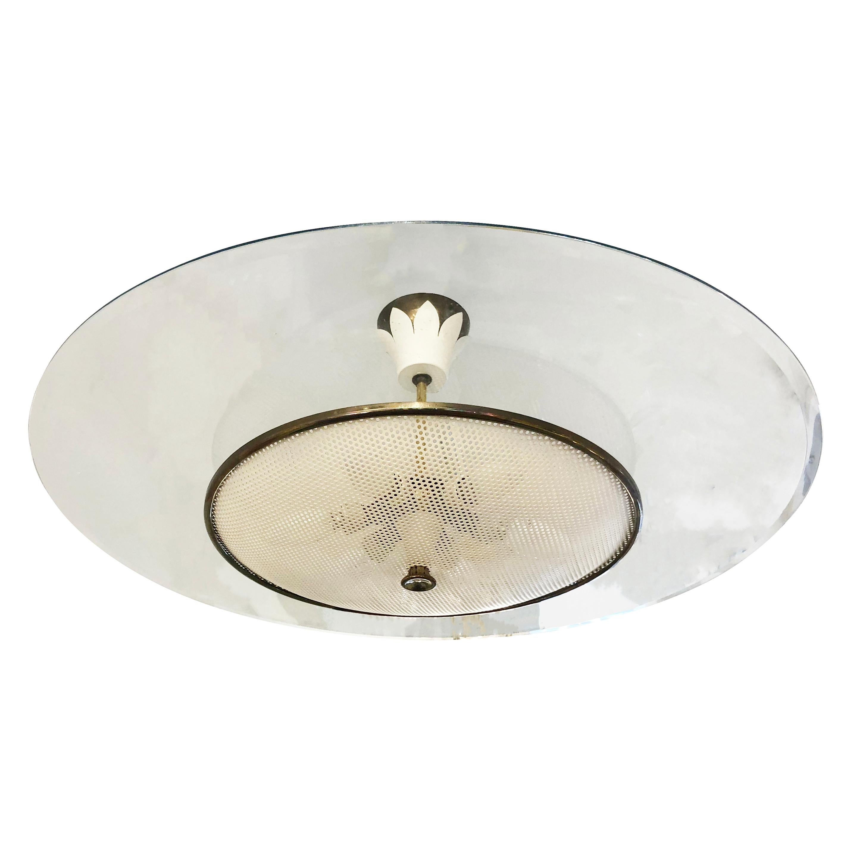 1940s chandelier attributed to Pietro Chiesa who was the artistic director of Fontana Arte at the time. Features a clear flat glass with beveled edges over a perforated shade. Brass and white lacquered details. The decorative canopy is a Classic