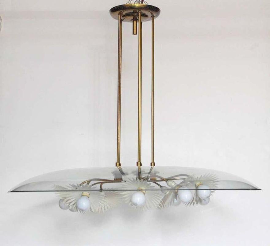 Important Italian chandelier with beveled glass, brass, and painted aluminum. Designed by Pietro Chiesa, manufactured by Fontana Arte, circa 1948, made in Italy
Currently all parts are in original condition including the light sockets which are not